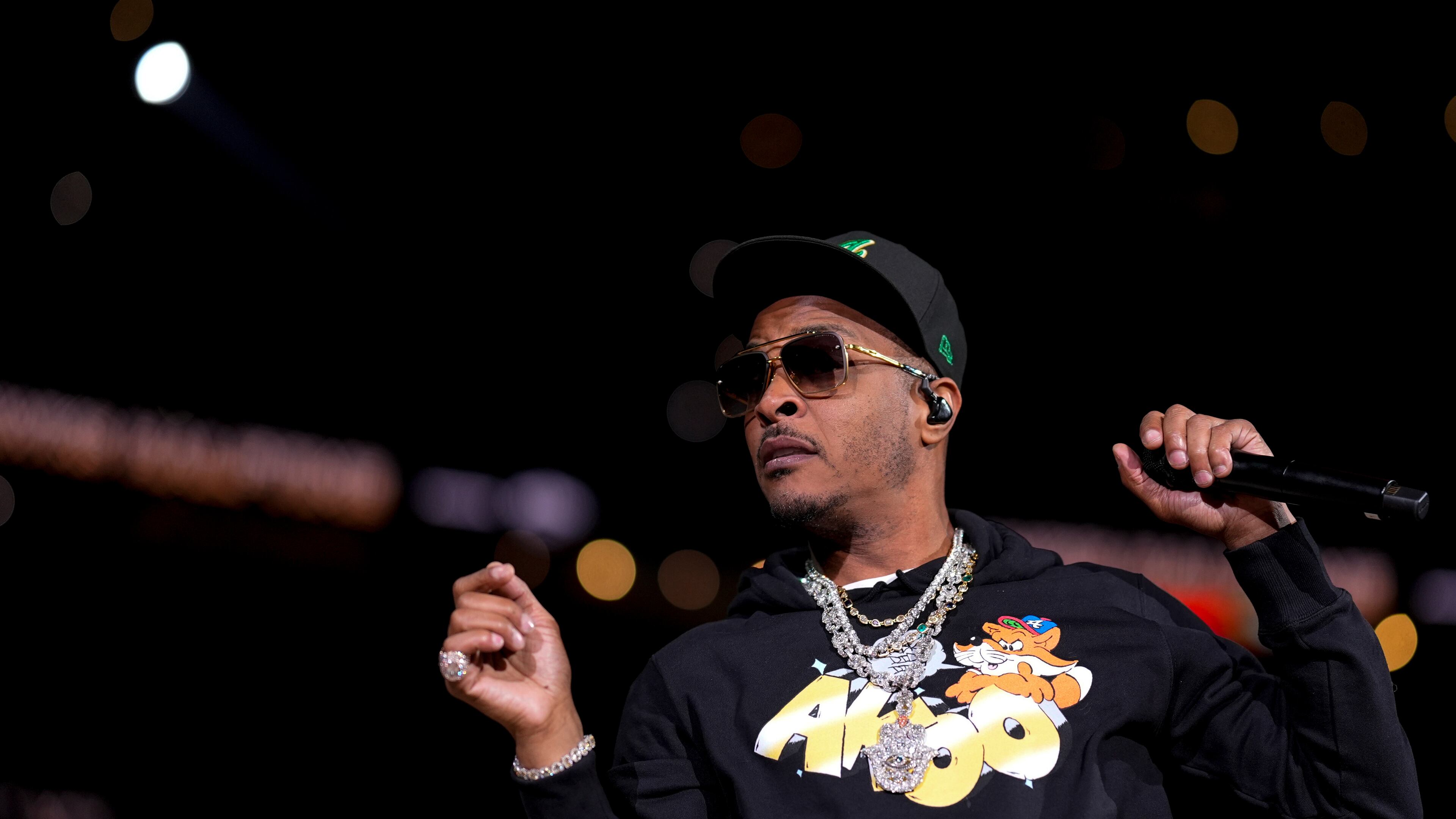 Rapper T.I performs at halftime of an NBA basketball game between the Atlanta Hawks and the Orlando Magic, Monday, March 16, 2026, in Atlanta. (AP Photo/Mike Stewart)