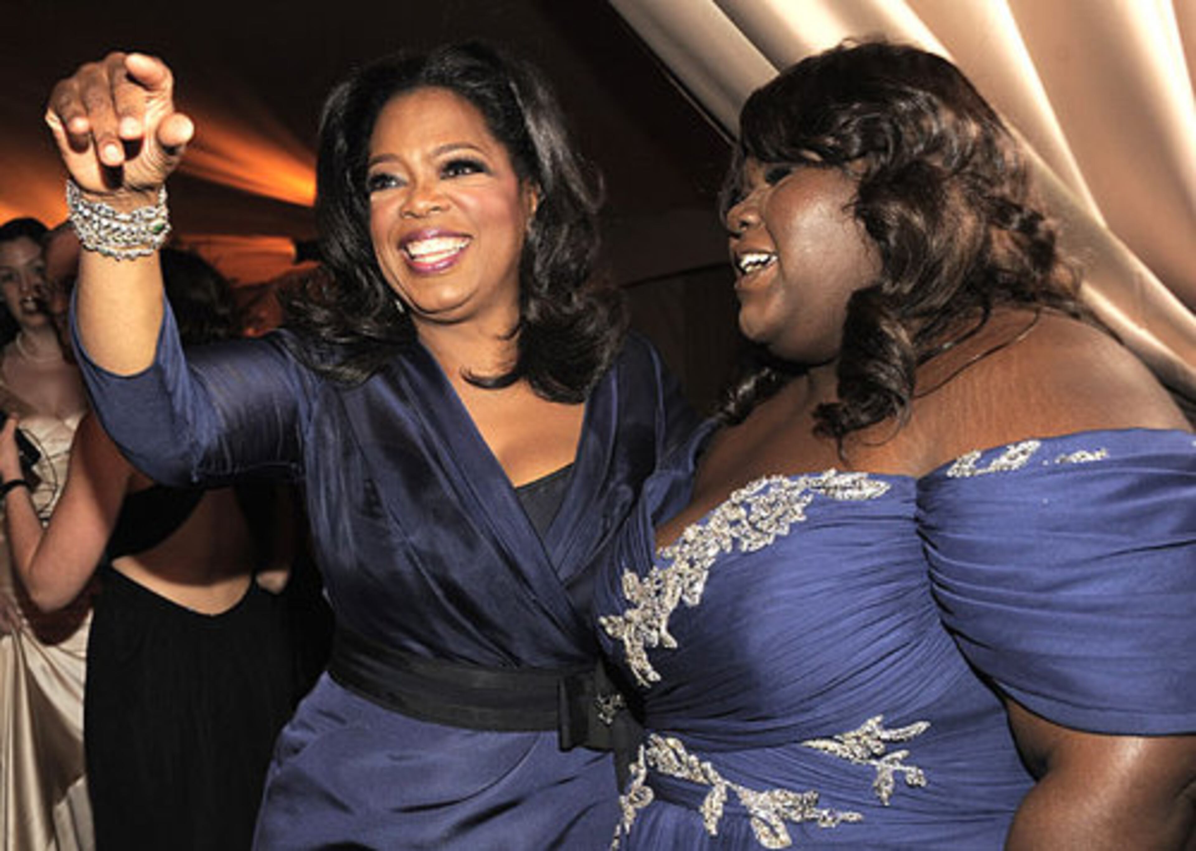 Oprah Winfrey celebrates with 'Precious' star Gabourey Sidibe.