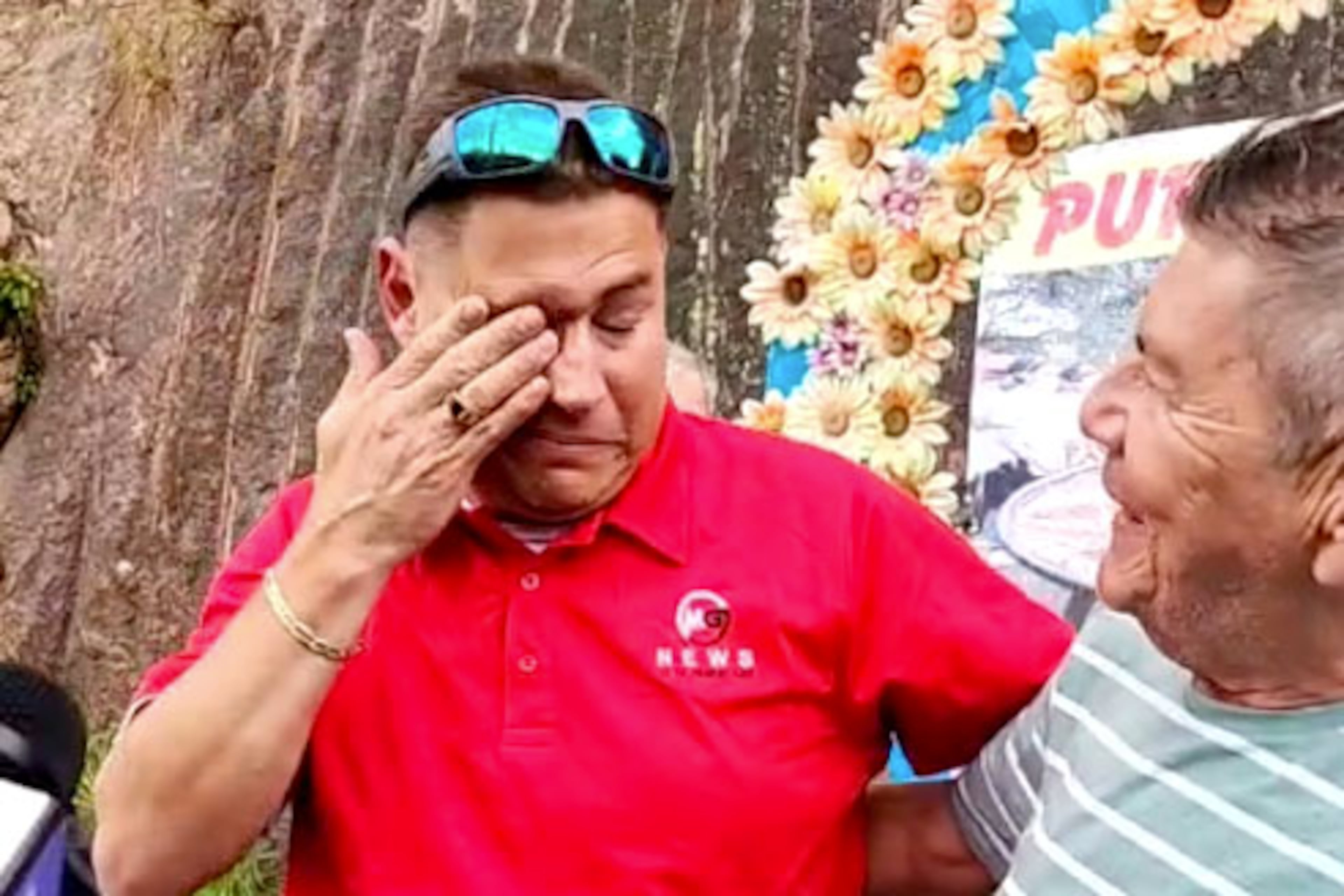 Spanish-language journalist Mario Guevara gets emotional as he arrives in Olocuilta, El Salvador. US immigration deported him this morning after being in immigration jail for over 100 days.
(Miguel Martinez/ AJC)