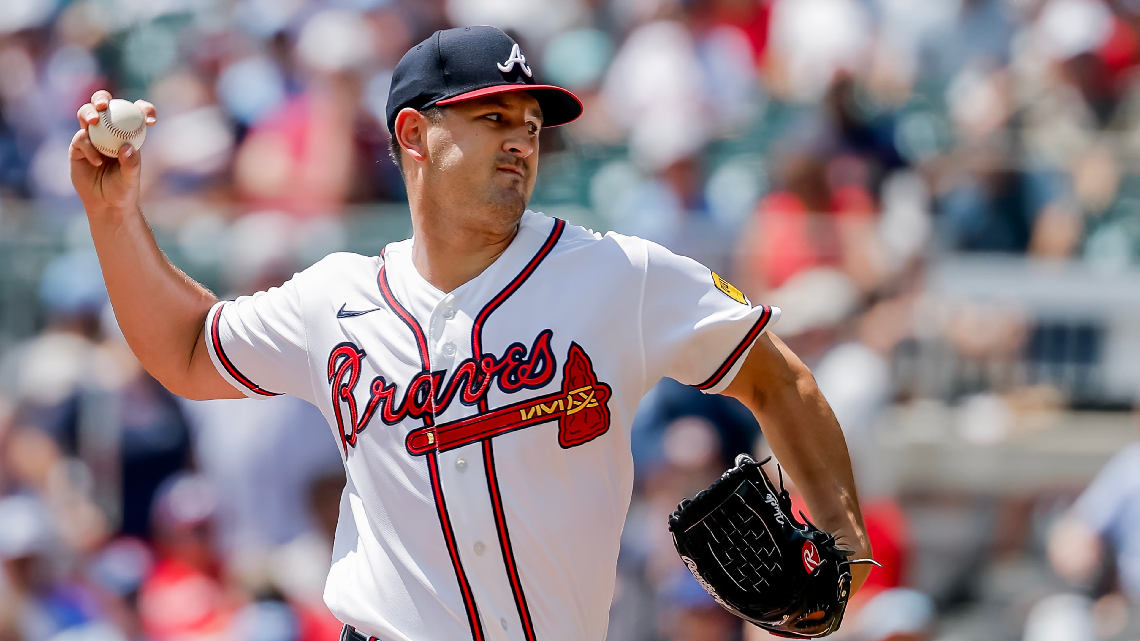 Atlanta Braves pitcher Tyler Mahle throws to a Colorado Rockies batter during Sunday's game in Atlanta. (Erik S. Lesser/AP)