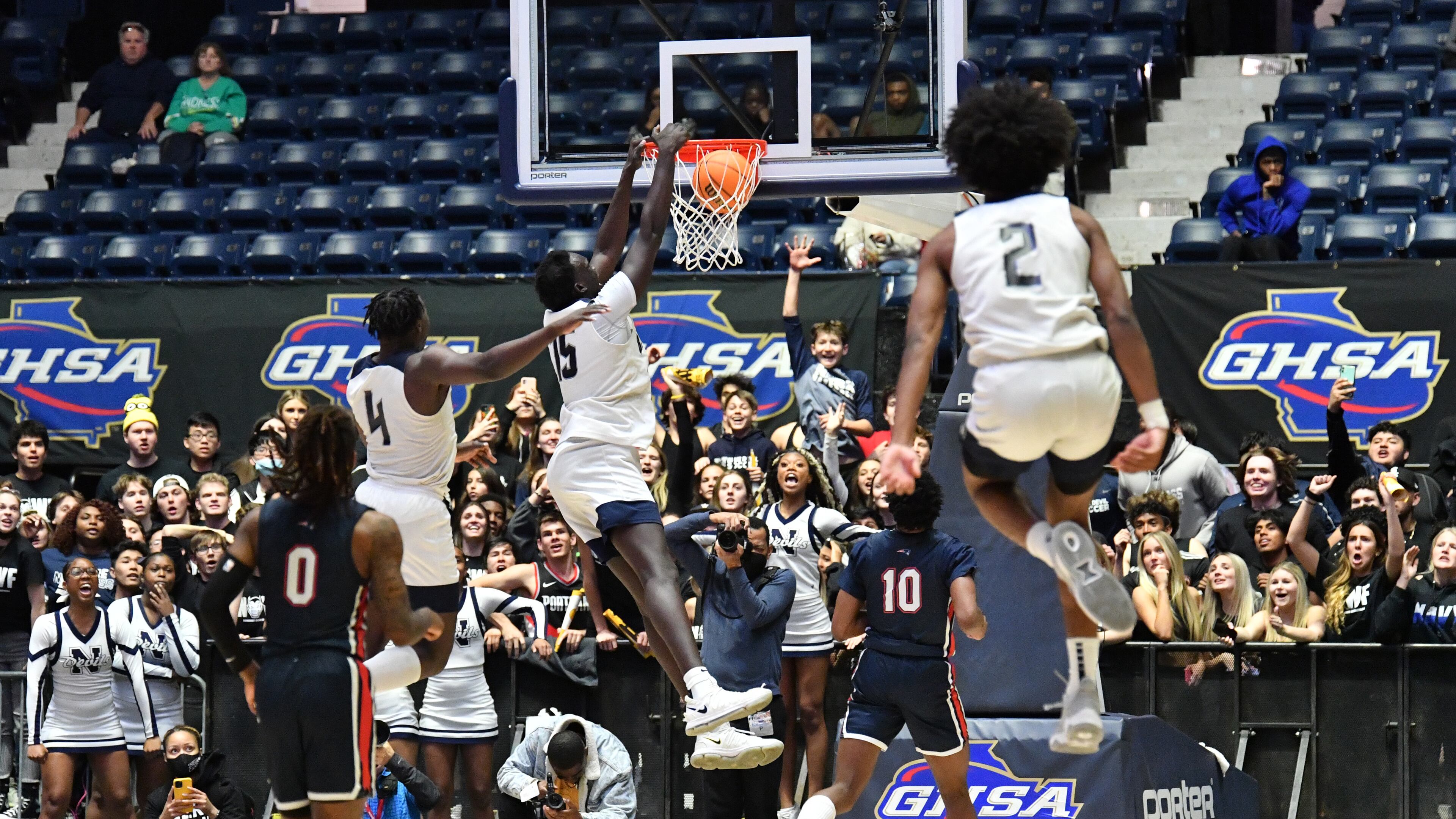 March 12, 2022 Macon - Norcross' Jerry Deng (15) dunks the ball at the end of the 4th quarter during the 2022 GHSA State Basketball Class AAAAAAA Boys Championship game at the Macon Centreplex in Macon on Saturday, March 12, 2022. Norcross won 58-45 over Berkmar. (Hyosub Shin / Hyosub.Shin@ajc.com)