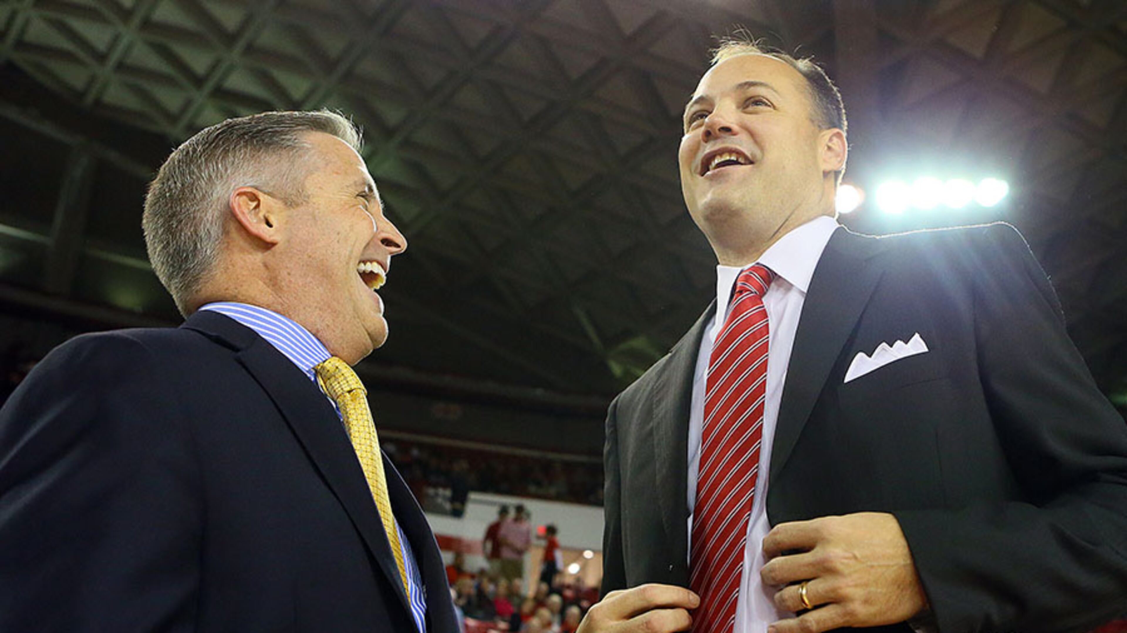 111513 ATHENS: Georgia Tech head coach Brian Gregory (left) and Georgia Bulldogs head coach Mark Fox share a laugh as they greet each other on the court before tip off in their game on Friday, Nov. 15, 2013, in Athens. CURTIS COMPTON /staff CCOMPTON@AJC.COM Wonder if Mark Fox will be laughing when he hears Brian Gregory has been talking to Tom Izzo. (Curtis Compton, AJC)
