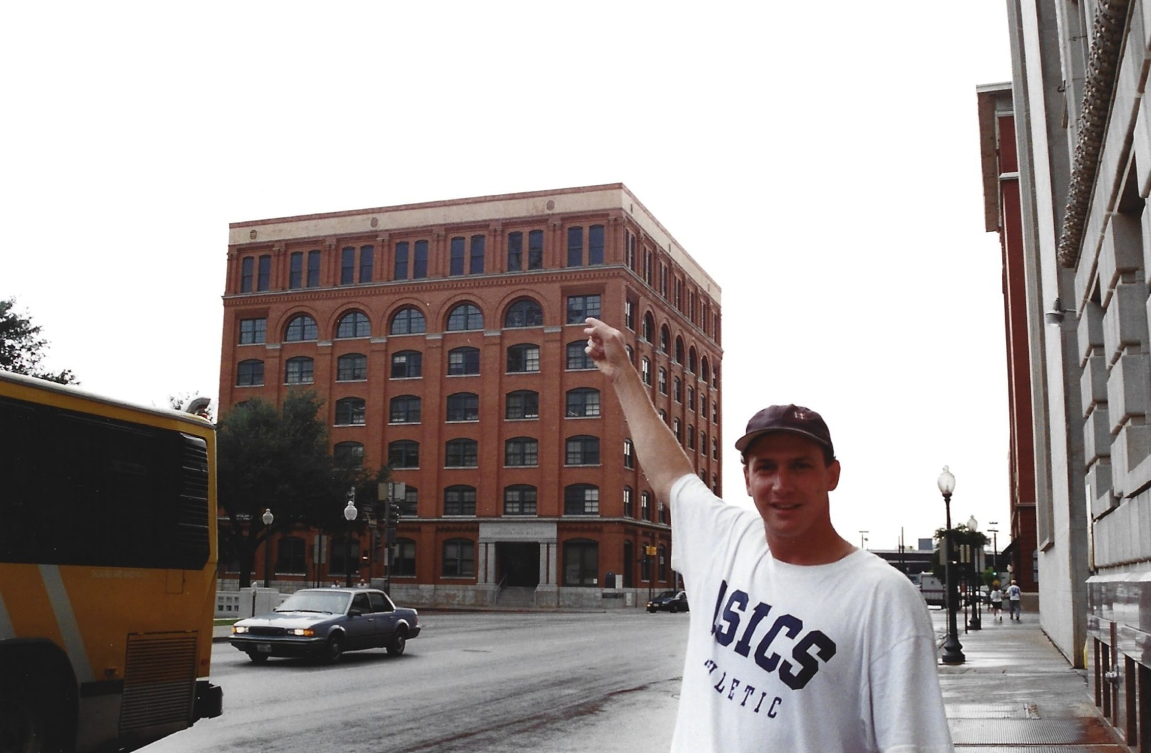 Steve stands in front of the Sixth Floor Museum in Dallas, which chronicles the 1963 assassination of President John F. Kennedy. (Courtesy of Steve Leo)