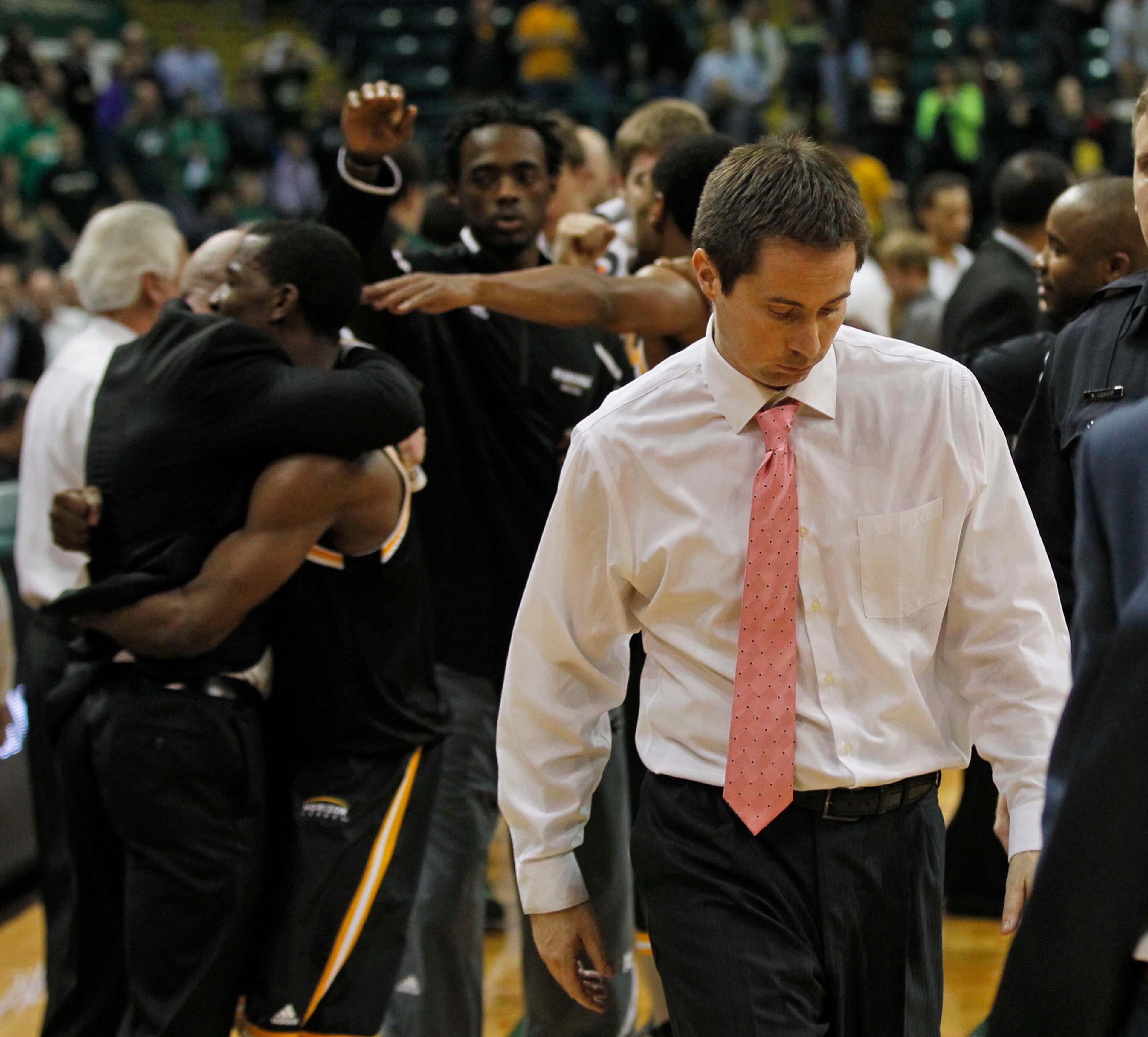 Wright State head coach Billy Donlon walks off the court after the Raiders were defeated by the Milwaukee Panthers 69-63 for the Horizon League Championship. TY GREENLEES / STAFF