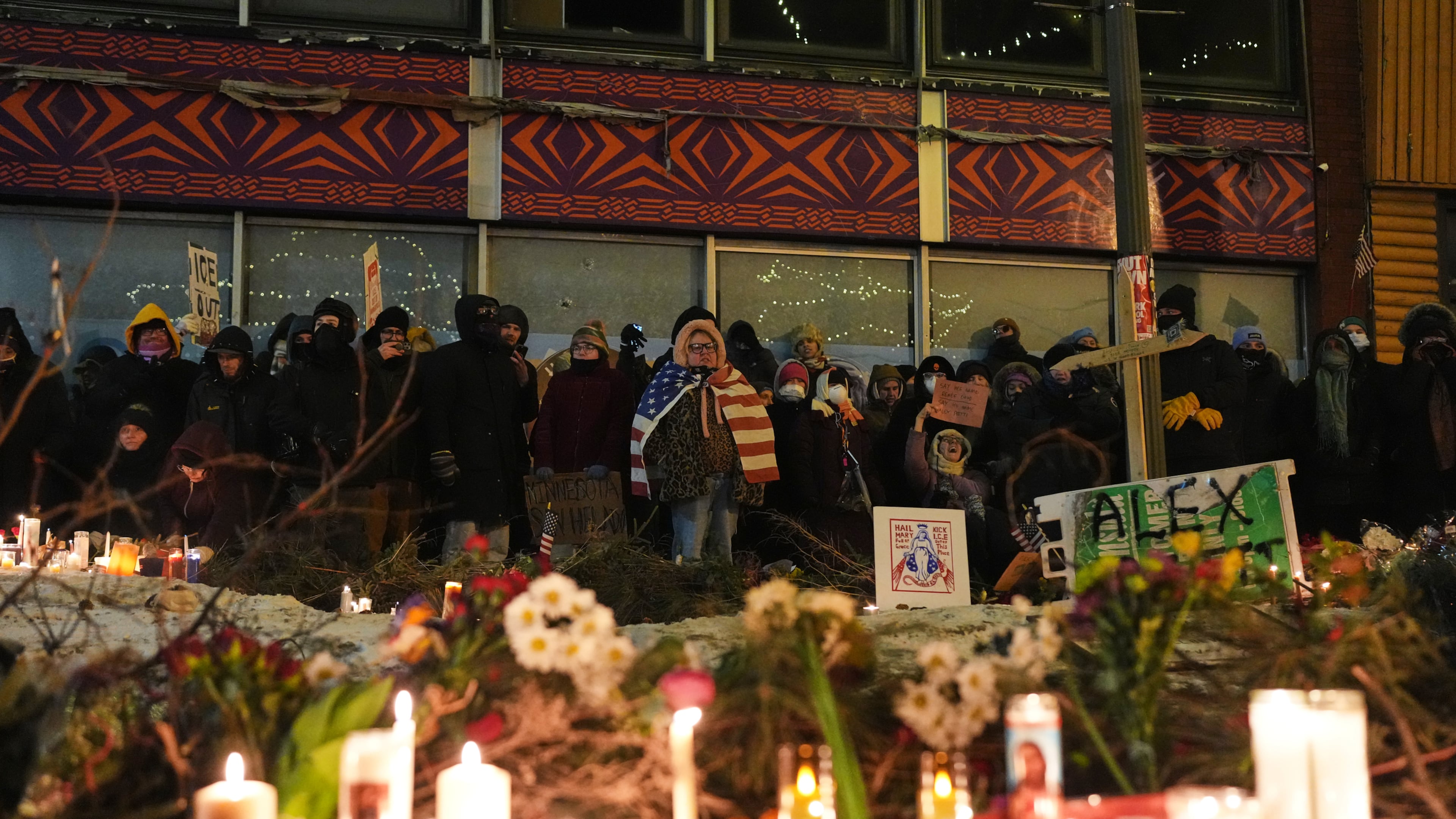 FILE - People gather during a vigil for 37-year-old Alex Pretti, who was fatally shot by a U.S. Border Patrol officer earlier in the day, Jan. 24, 2026, in Minneapolis. (AP Photo/Adam Gray, File)