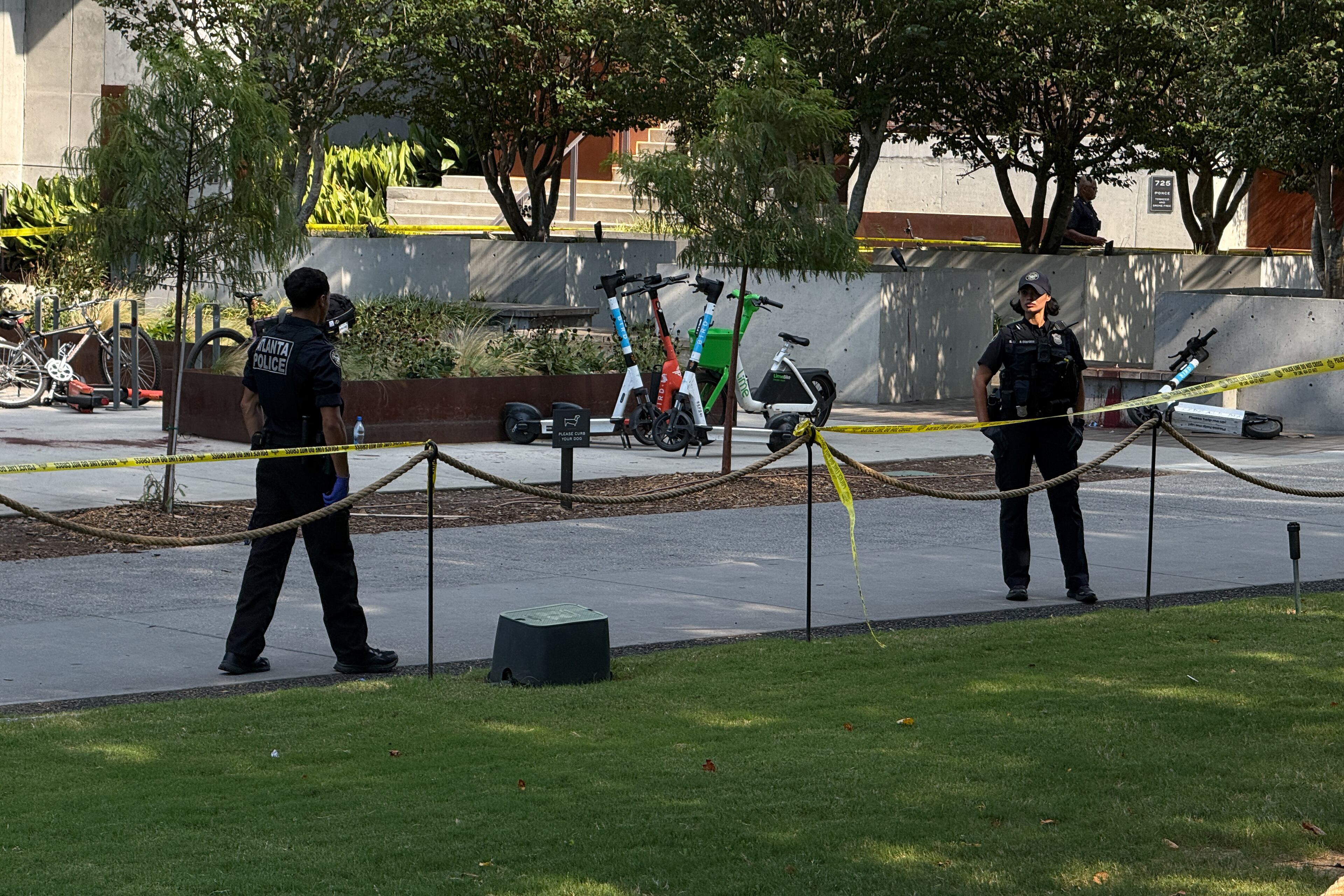 Police investigate the scene of a fatal stabbing along the Atlanta Beltline on Sunday, Aug. 23, 2026. (Megan Varner for the AJC)