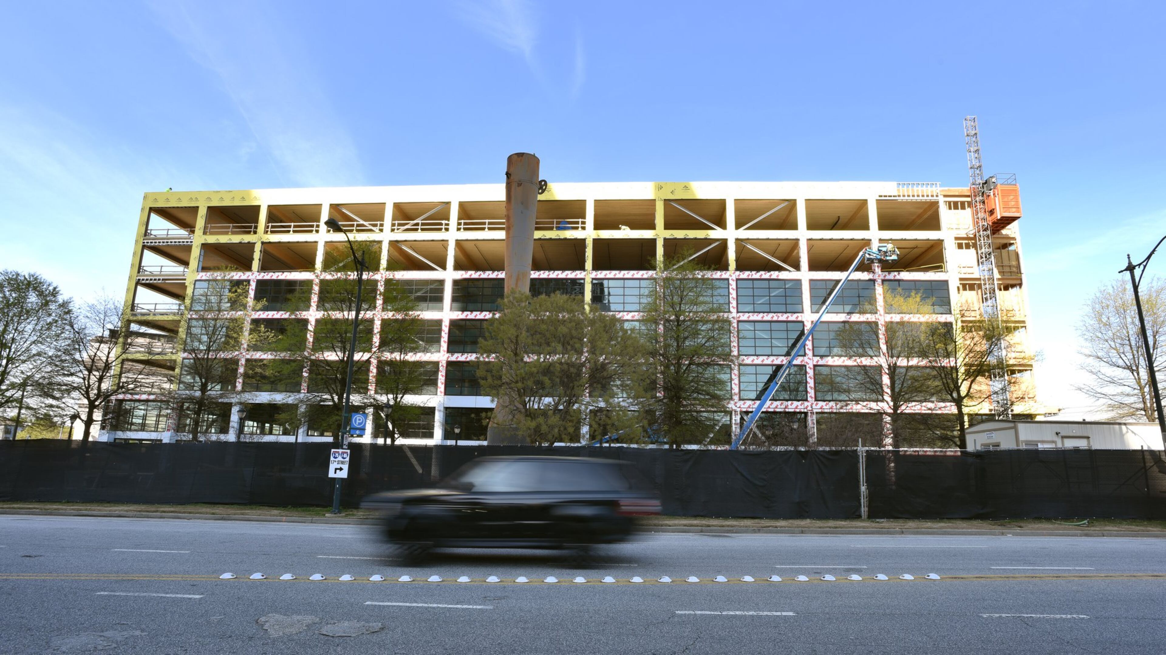 Exterior of T3 West Midtown construction site in Atlantic Station on April 3, 2019. T3 West Midtown is new generation of heavy timber building that redefines the standard for the modern creative office. Mega developer Hines, which owns Atlantic Station, is building a timber-framed office building in Midtown. It’s the only office building of its type known to be under construction in the metro area. HYOSUB SHIN / HSHIN@AJC.COM