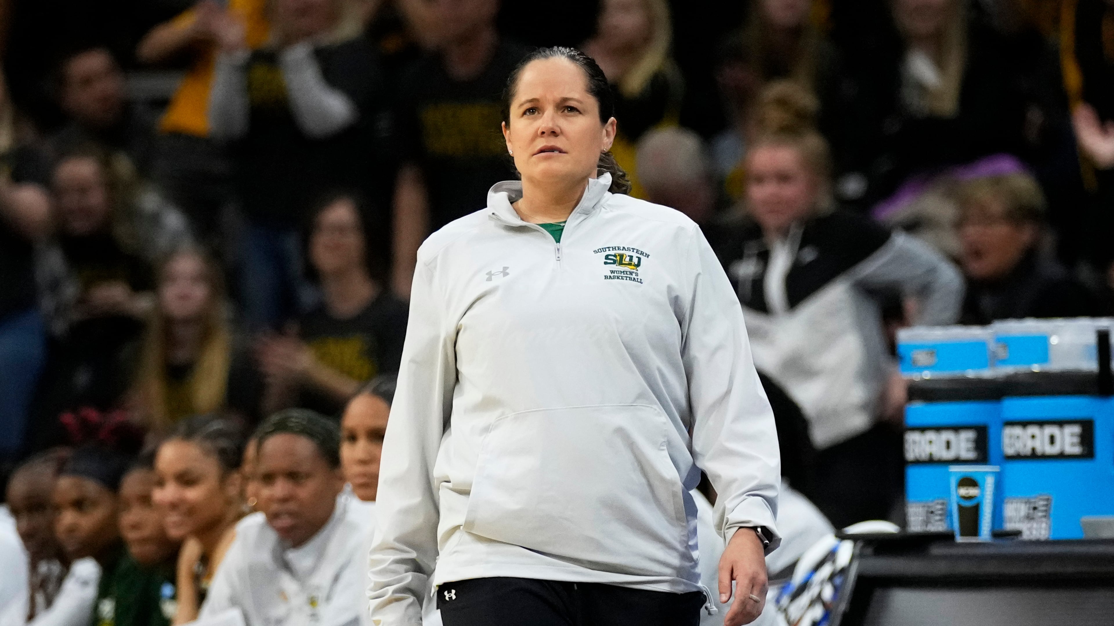 FILE - Southeastern Louisiana head coach Ayla Guzzardo watches from the bench in the first half of a first-round college basketball game against Iowa in the NCAA Tournament, March 17, 2023, in Iowa City, Iowa. (AP Photo/Charlie Neibergall, File)