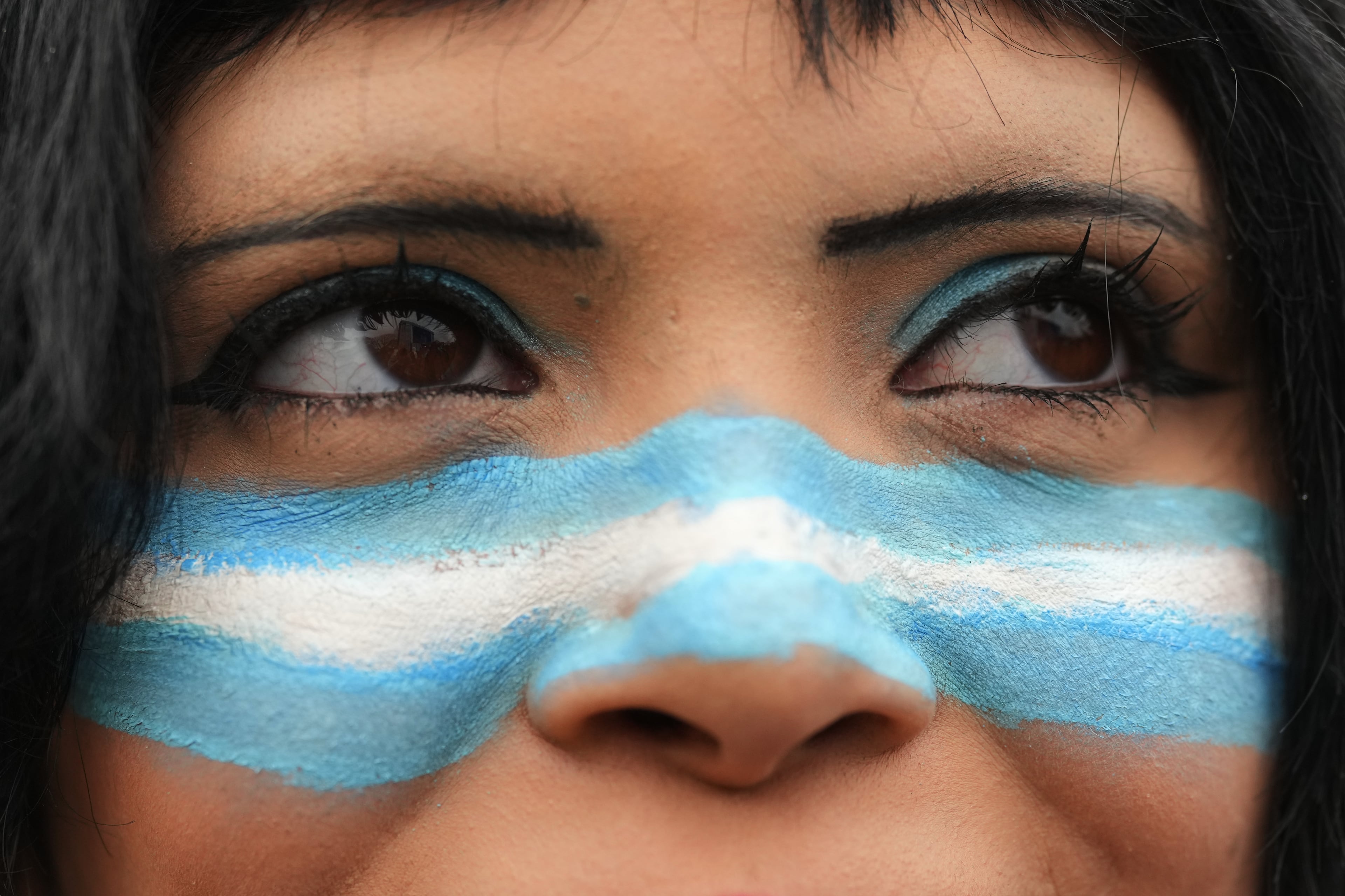 A fan watches the World Cup final soccer match between Argentina and Spain in Buenos Aires, Argentina, Sunday, July 19, 2026. (Gustavo Garello/AP)