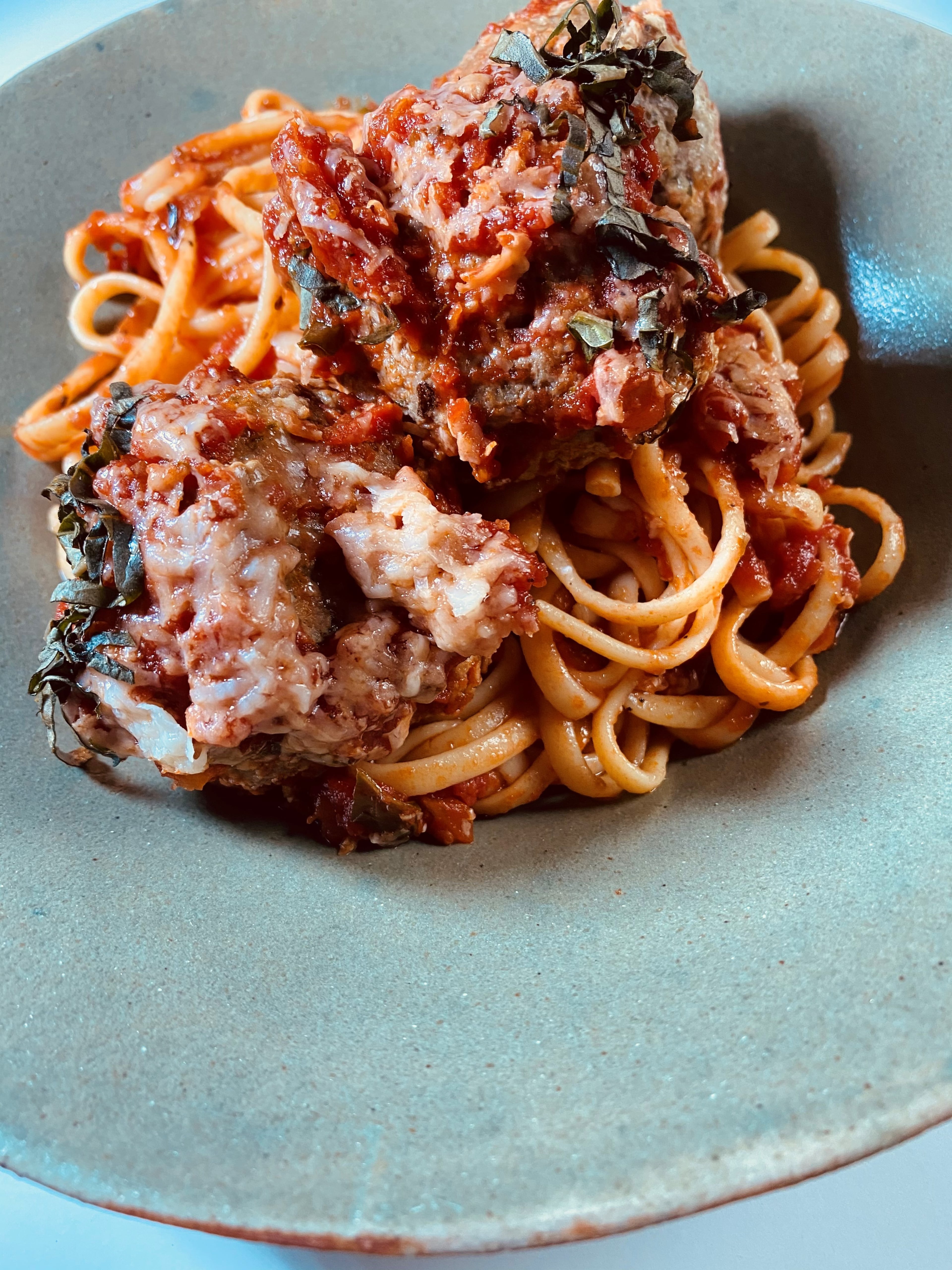 Nonna’s spaghetti and meatballs at Amalfi is served with house-made meatballs and San Marzano sauce. Bob Townsend for The Atlanta Journal-Constitution