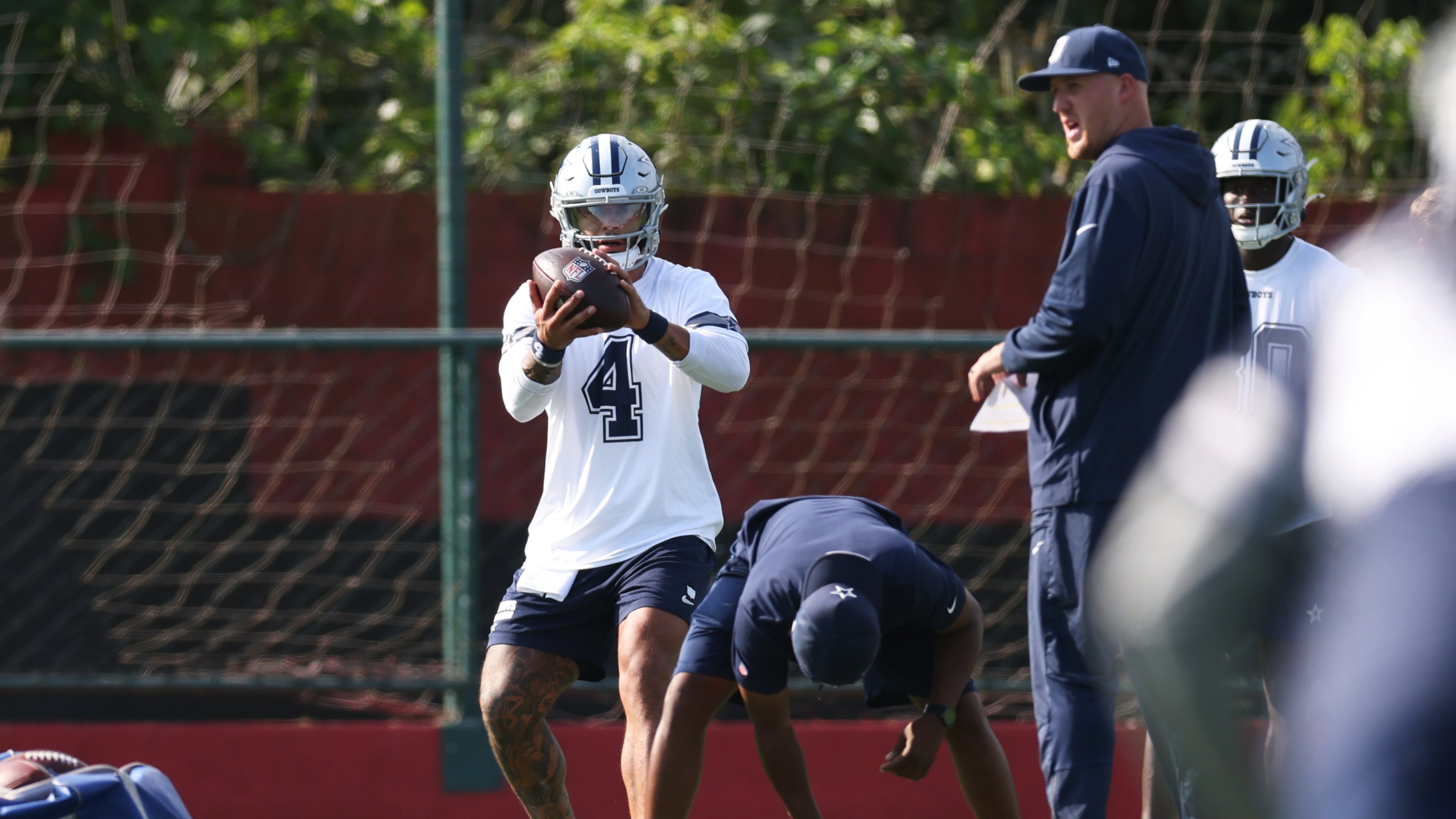 Dallas Cowboys quarterback Dak Prescott (4) works out during a practice for an NFL football game against the Baltimore Ravens in Rio de Janeiro, Friday, Sept. 25, 2026. (AP Photo/Lucas Figueiredo)