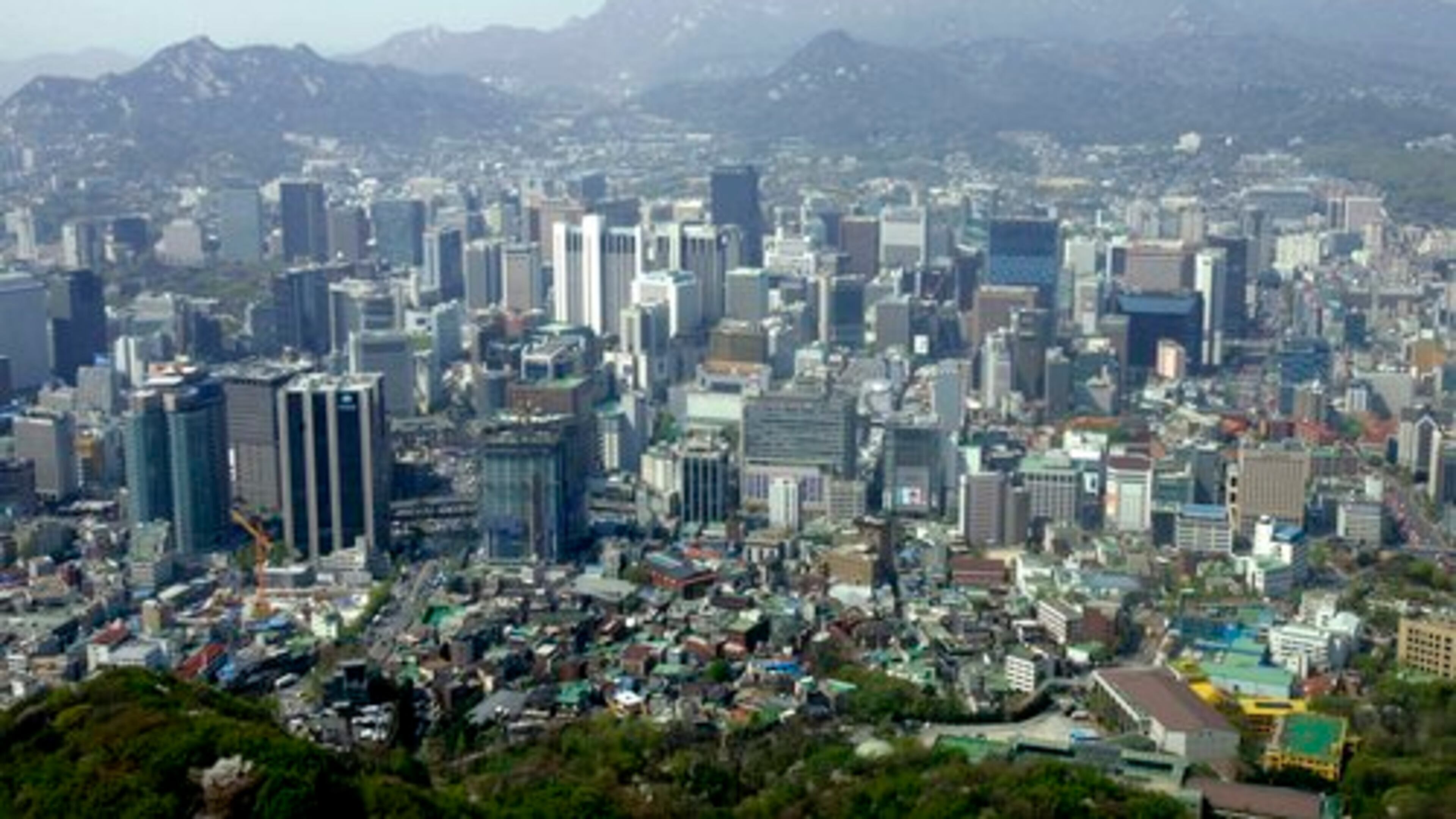 A city view is seen from the observation deck of Seoul Tower, South Korea. With the South Korean currency, called the won, down against the dollar, now's the time to wander the grounds of 600-year-old palaces, meditate in Buddhist temples and trawl cafes and markets in the labyrinthine capital city, Seoul.