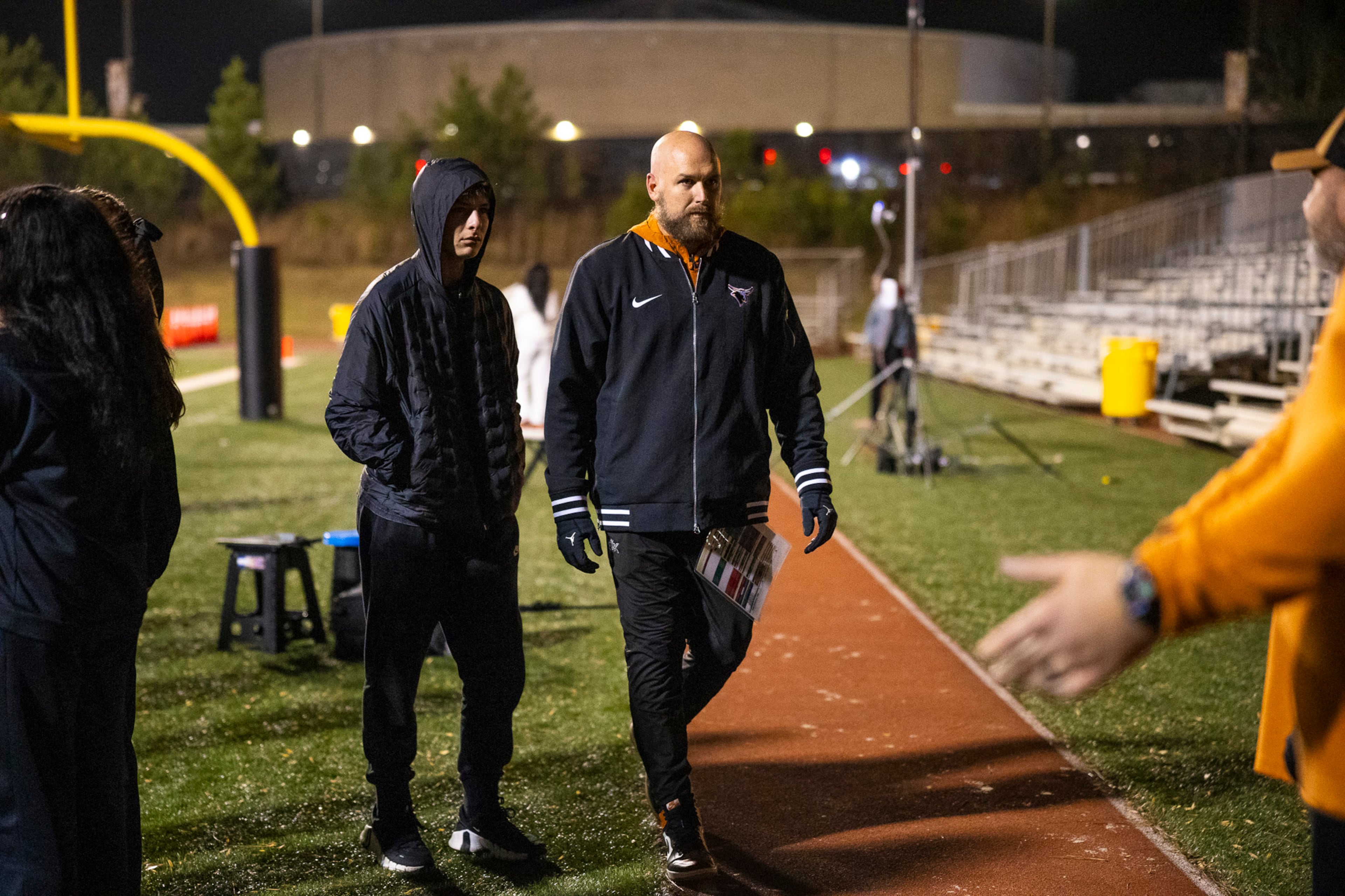 Kell head coach Bobby May walks off the field after a hard-fought loss during the Class 4A semifinal against Creekside on Friday, Dec. 5, 2025, at Creekside High School in Fairburn. (Oscar Guevara Saenz for the AJC)