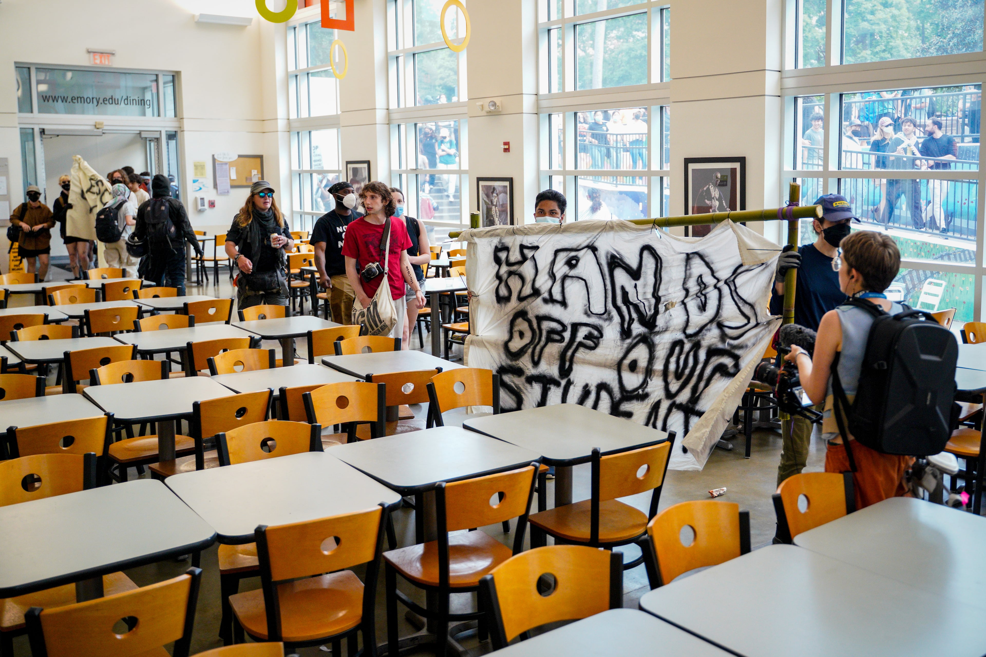 Student protesters briefly occupied a dining hall on campus. Protesters gathered for a second day of pro-Palestine demonstrations on the Emory University quad on Friday, April 26, 2024. (Ben Hendren for The Atlanta Journal-Constitution)