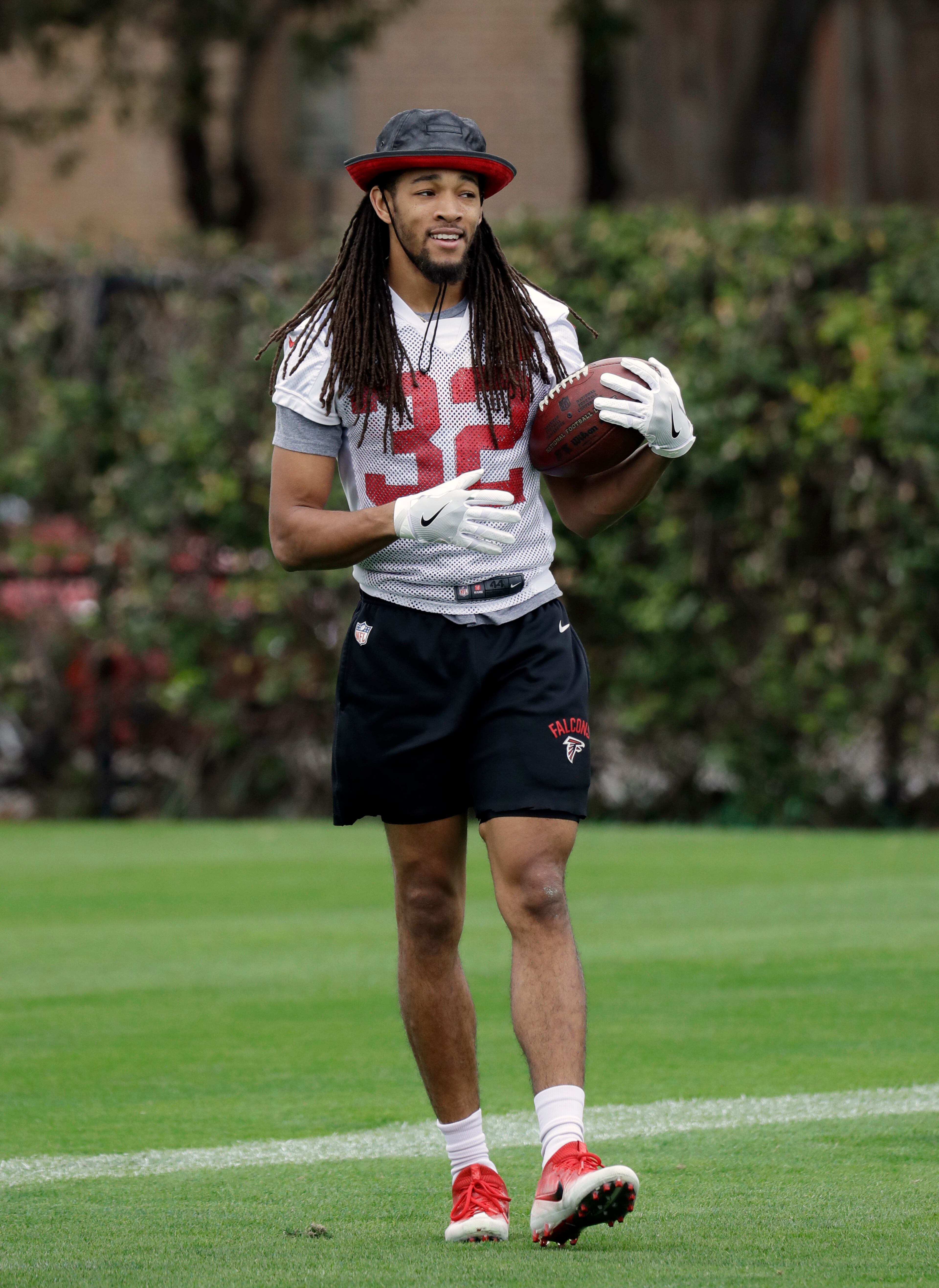 Atlanta Falcons cornerback Jalen Collins (32) takes part in a practice for the NFL Super Bowl 51 football game Friday, Feb. 3, 2017, in Houston. Atlanta will face the New England Patriots in the Super Bowl Sunday. (AP Photo/Eric Gay)