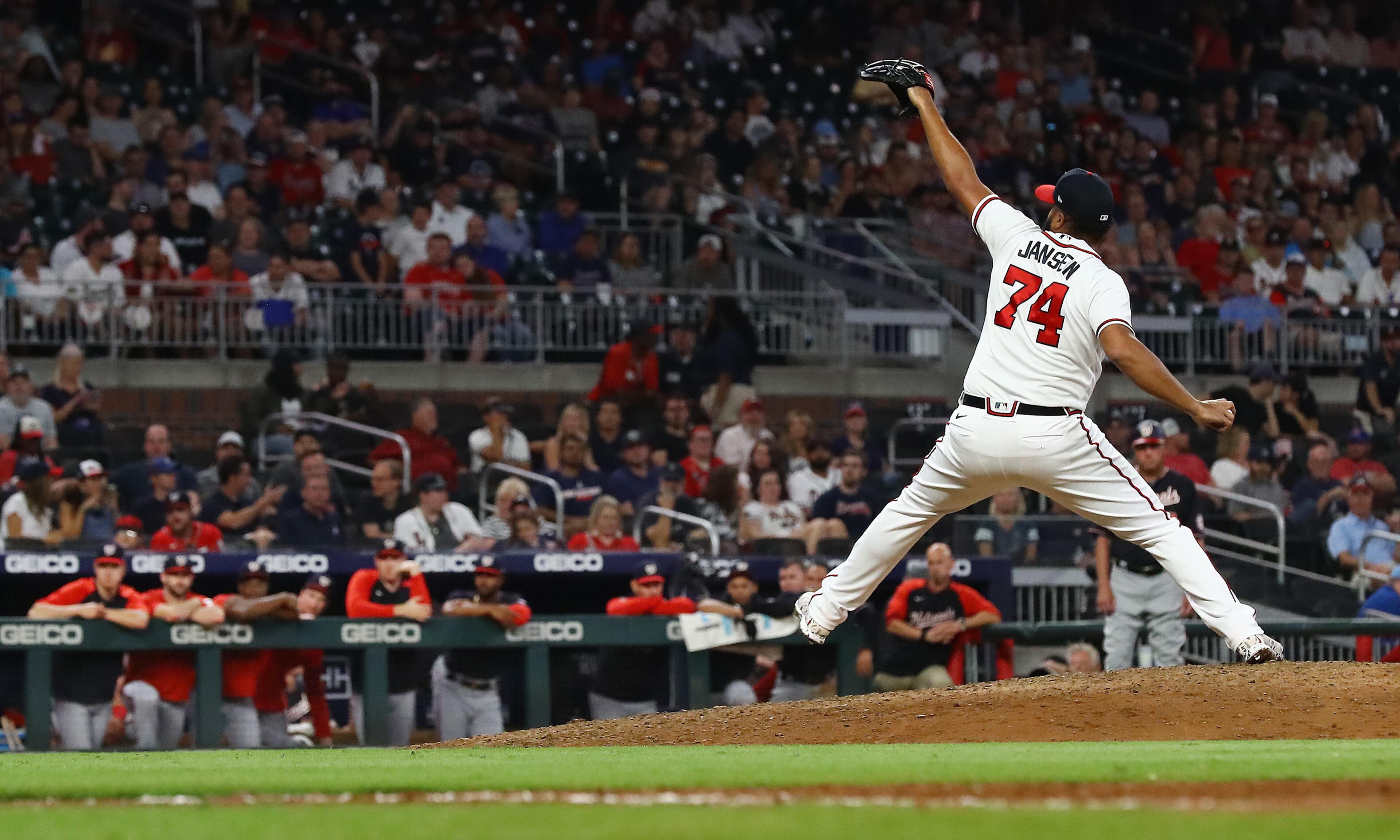 Braves closer Kenley Jansen delivers during the ninth inning against the Nationals on Monday night at Truist Park. (Curtis Compton / Curtis Compton@ajc.com)