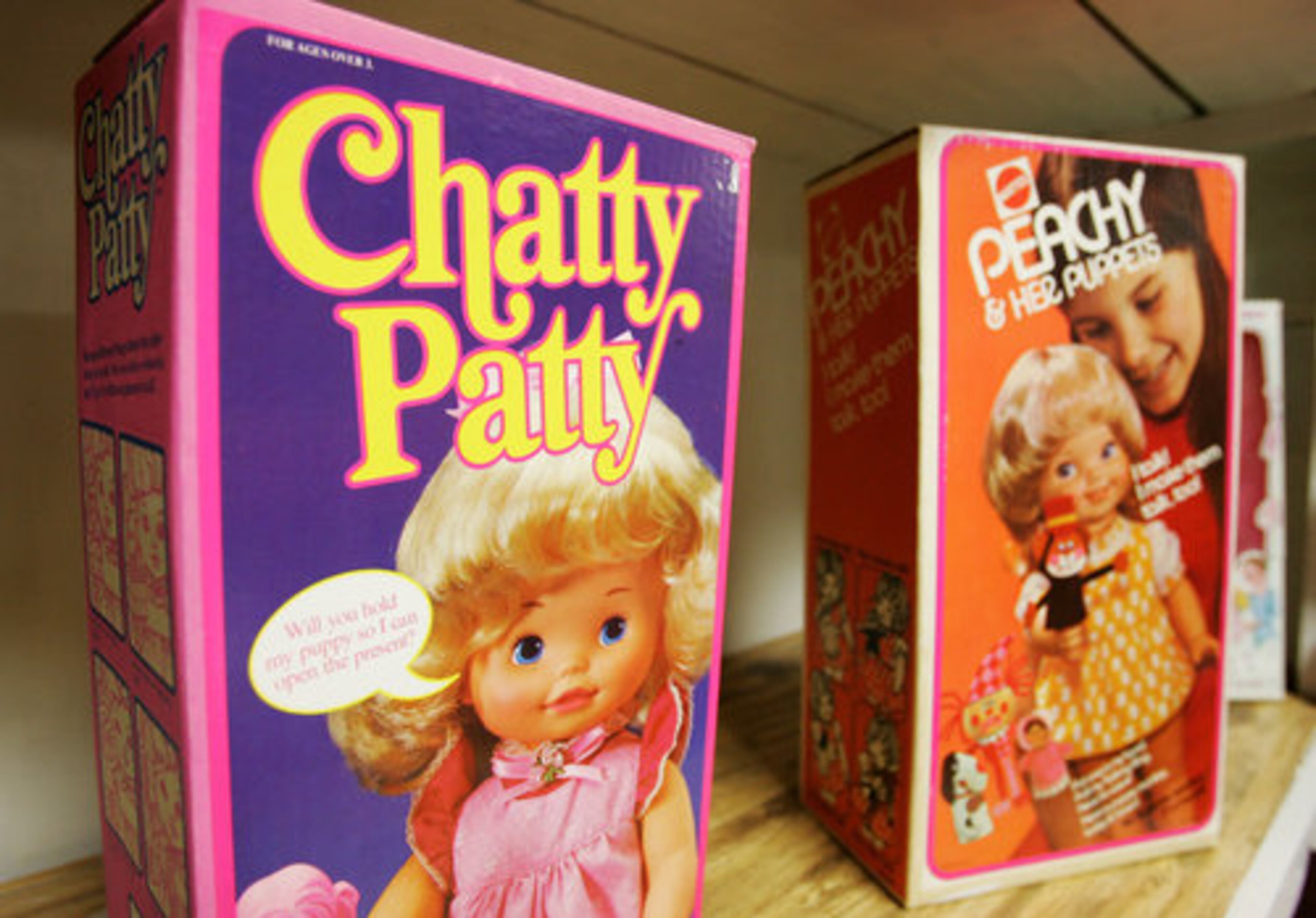 Chatty Patty and Thumbelina dolls stand on a shelf waiting to enchant little girls from a previous decade. In addition, Dubble Bubble gum goes three pieces for a nickel and a collection of costume jewelry from the 1950s is spread out in a flat basket with pieces starting at 29 cents.