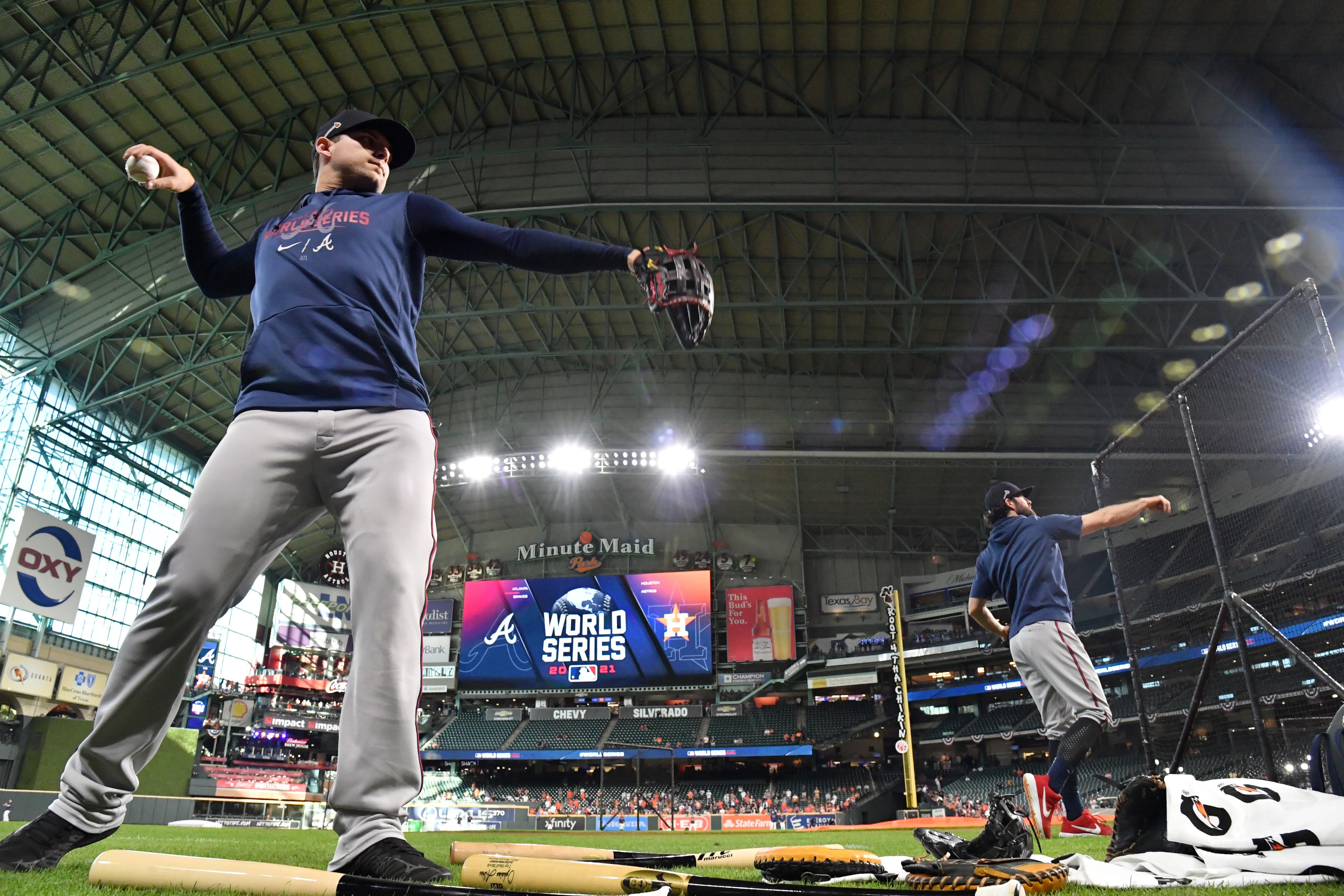 Braves third baseman Austin Riley (left) and shortstop Dansby Swanson (right) work out on the field prior to Game 2 of baseball's World Series at Minute Maid Park in Houston on Wednesday, October 27, 2021. (Hyosub Shin / Hyosub.Shin@ajc.com)