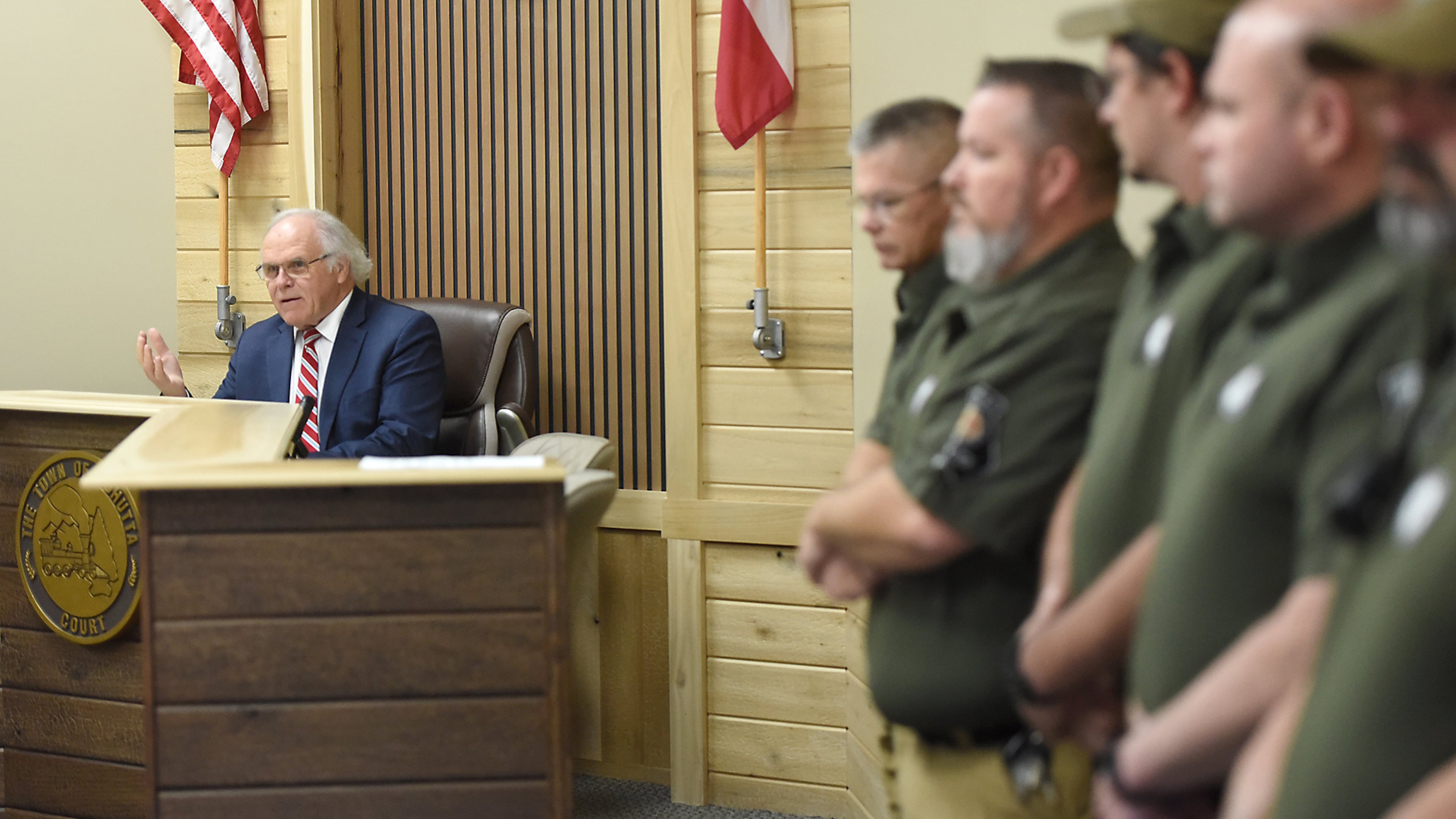 Members of the Cohutta Police Department look on as Mayor Ron Shinnick speaks at Cohutta Town Hall in Cohutta, Ga. on Thursday, April 30, 2026. (Matt Hamilton/Chattanooga Times Free Press via AP)