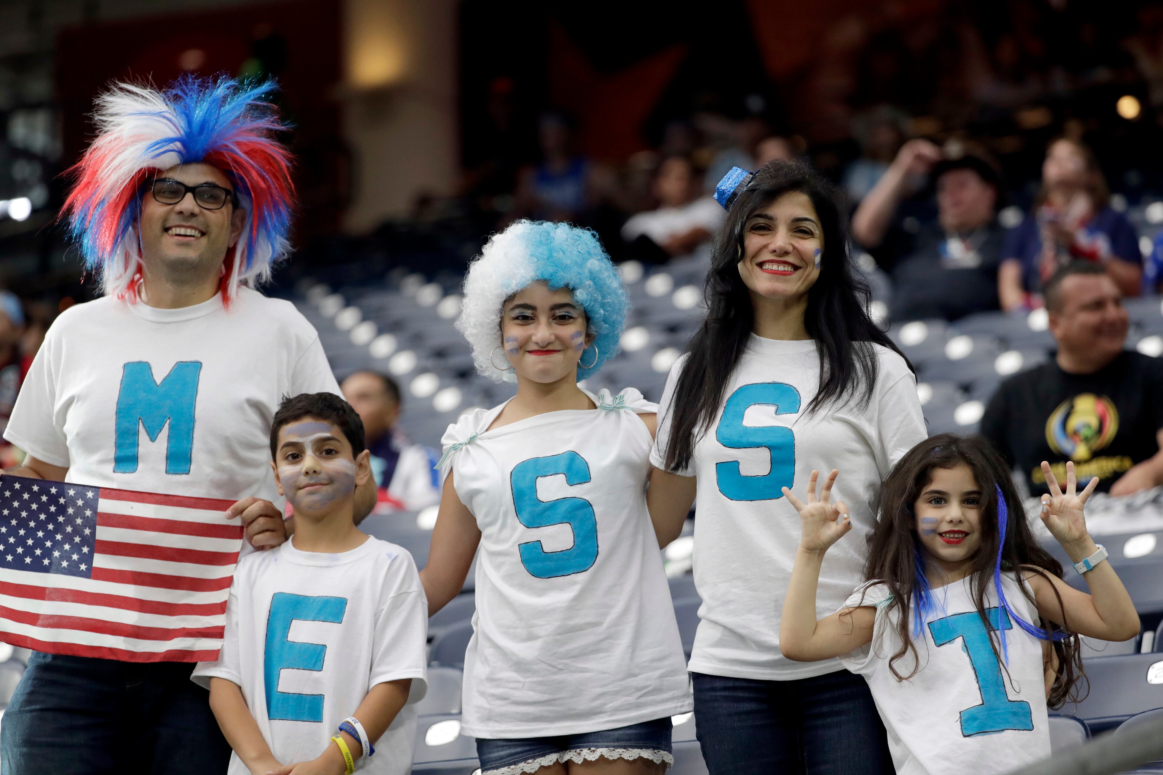 Argentina fans show their support for midfielder Lionel Messi before a Copa America Centenario semifinal soccer match between the United States and Argentina Tuesday, June 21, 2016, in Houston. (AP Photo/David J. Phillip)