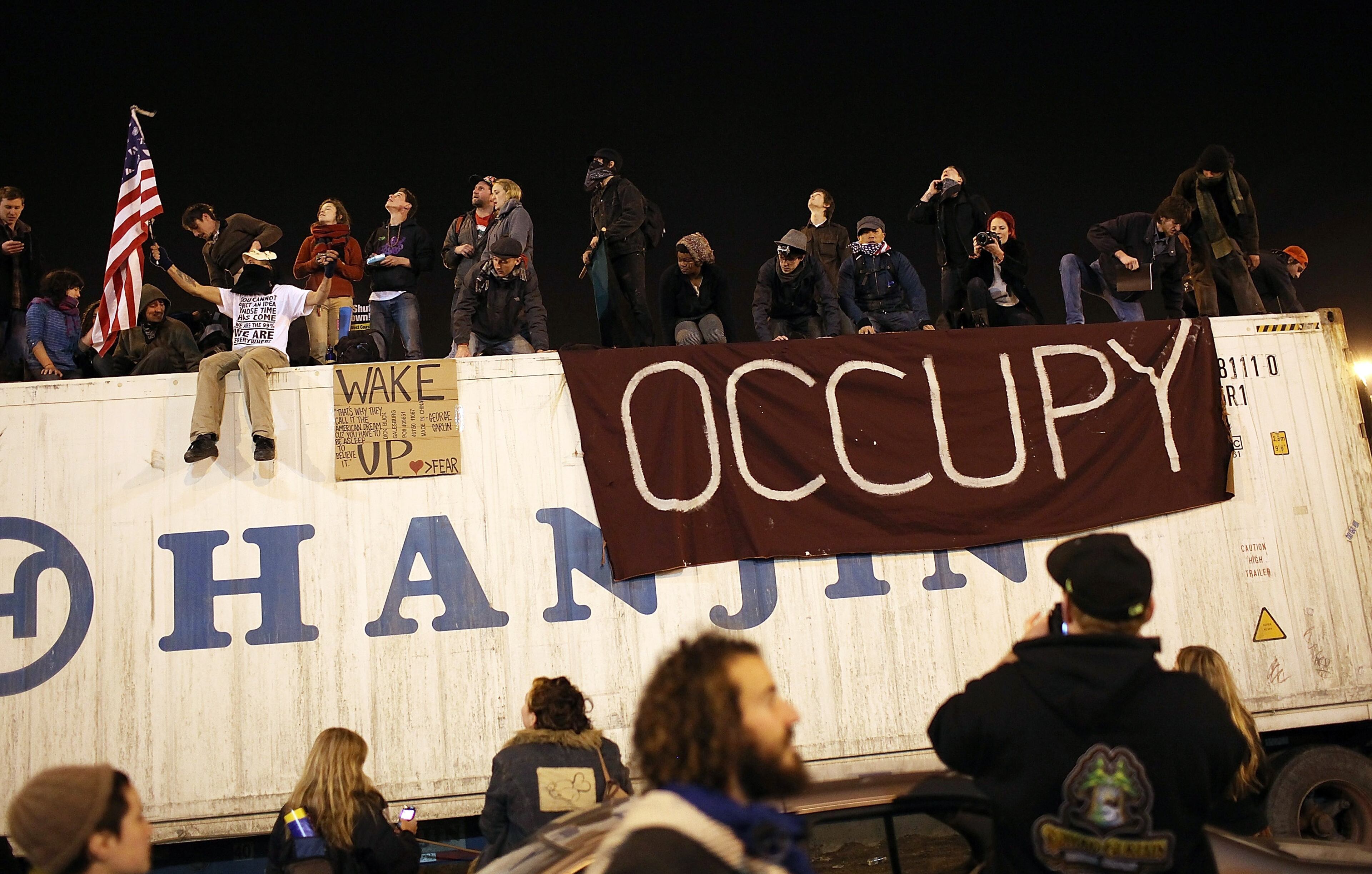 2011 - The Protester. 2011 was the year of the protestors. The Occupy Movement, Tea Party movement, and Arab Spring all were the focus of cameras. No matter the message, protestors were front and center. Occupy protestors sit on the top of a truck as they march at the Port of Oakland on December 12, 2011 in Oakland, California. Following a general strike coordinated by Occupy Oakland that closed the Port of Oakland on November 2, Occupy Wall Street protestors are attempting to shut down all West Coast ports in Los Angeles, San Diego, Oakland, Portland, Seattle and Tacoma. (Photo by Justin Sullivan/Getty Images)