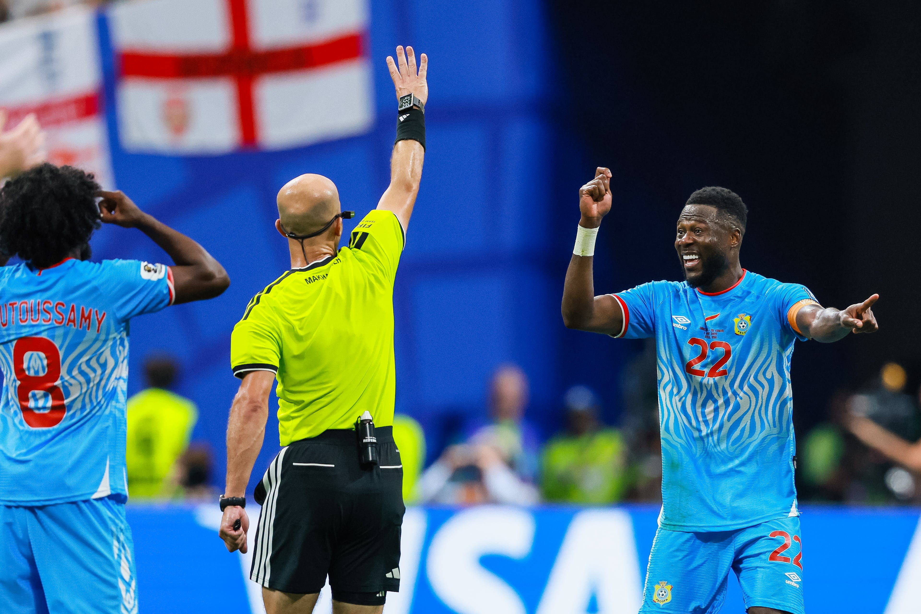 Congo defender Chancel Mbemba (right) reacts after a collision with England results in a penalty for England during the first half of a FIFA World Cup round of 32 match at Atlanta Stadium (Mercedes-Benz Stadium) on Wednesday, July 1, 2026, in Atlanta. (Jason Getz/AJC)