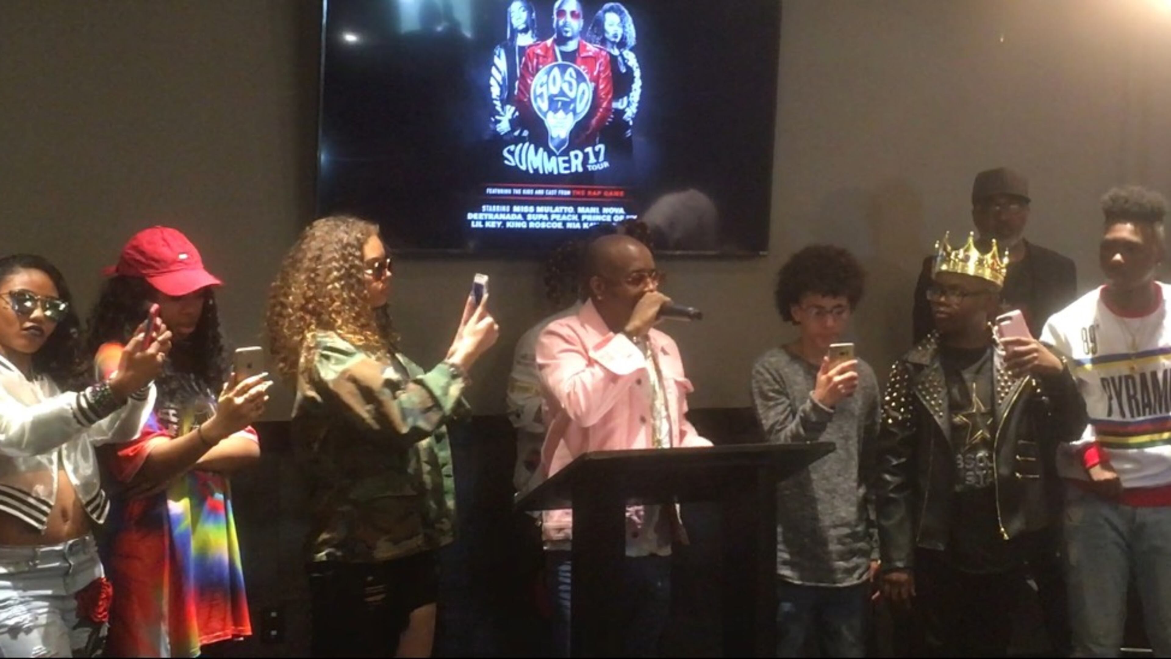 Jermaine Dupri, center, talks up the upcoming SoSoSUMMER17 Tour while Rap Game alums on either side live stream the event on their phones. Photo: Jennifer Brett