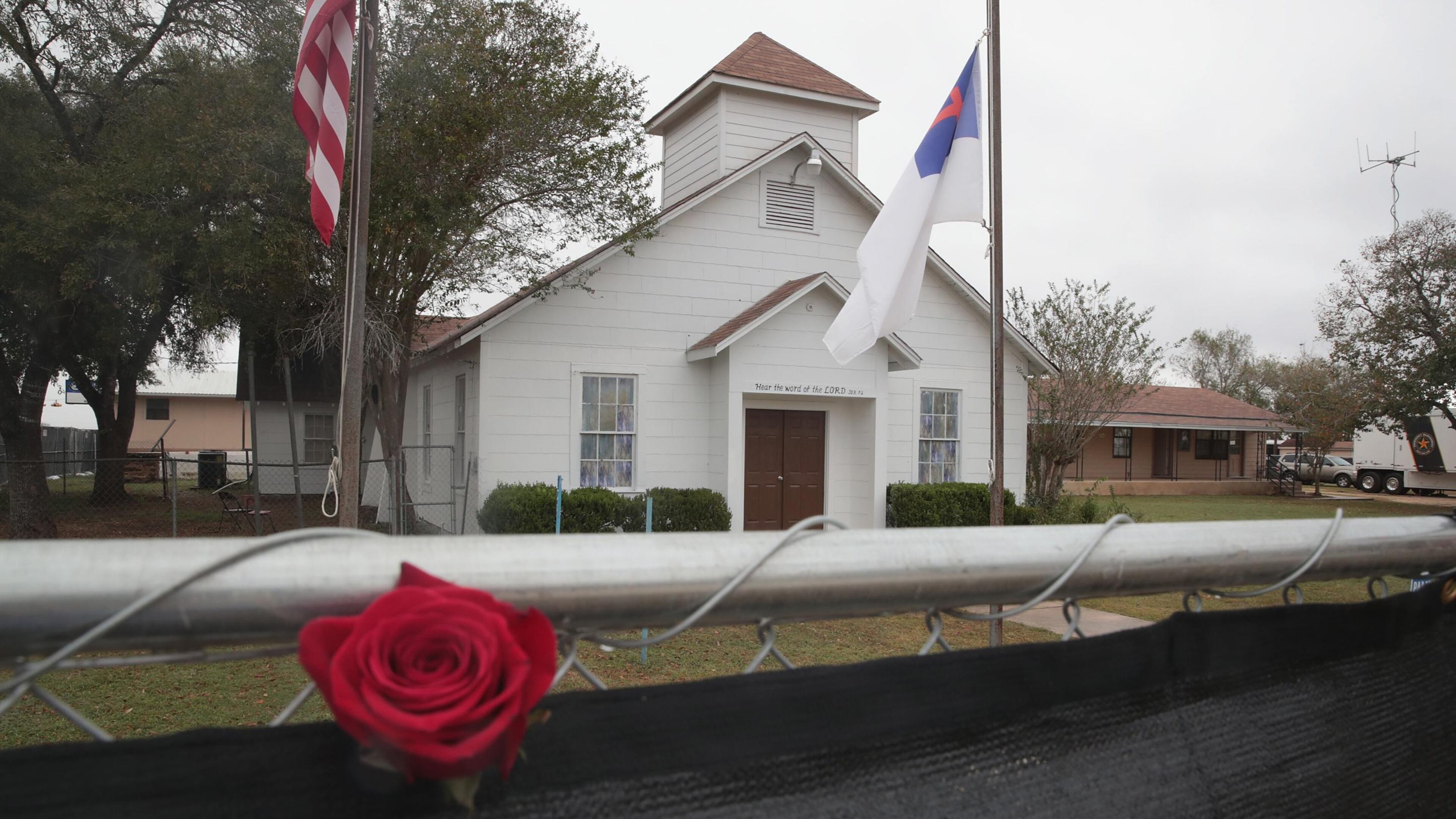 FILE PHOTO: A rose is left in the fence surrounding the First Baptist Church of Sutherland Springs on November 12, 2017 in Sutherland Springs, Texas. The congregation held service today in a tent on the towns ball park. A gunman shot and killed the 26 people and wounded 20 others when he opened fire during Sunday service at the church. (Photo by Scott Olson/Getty Images)