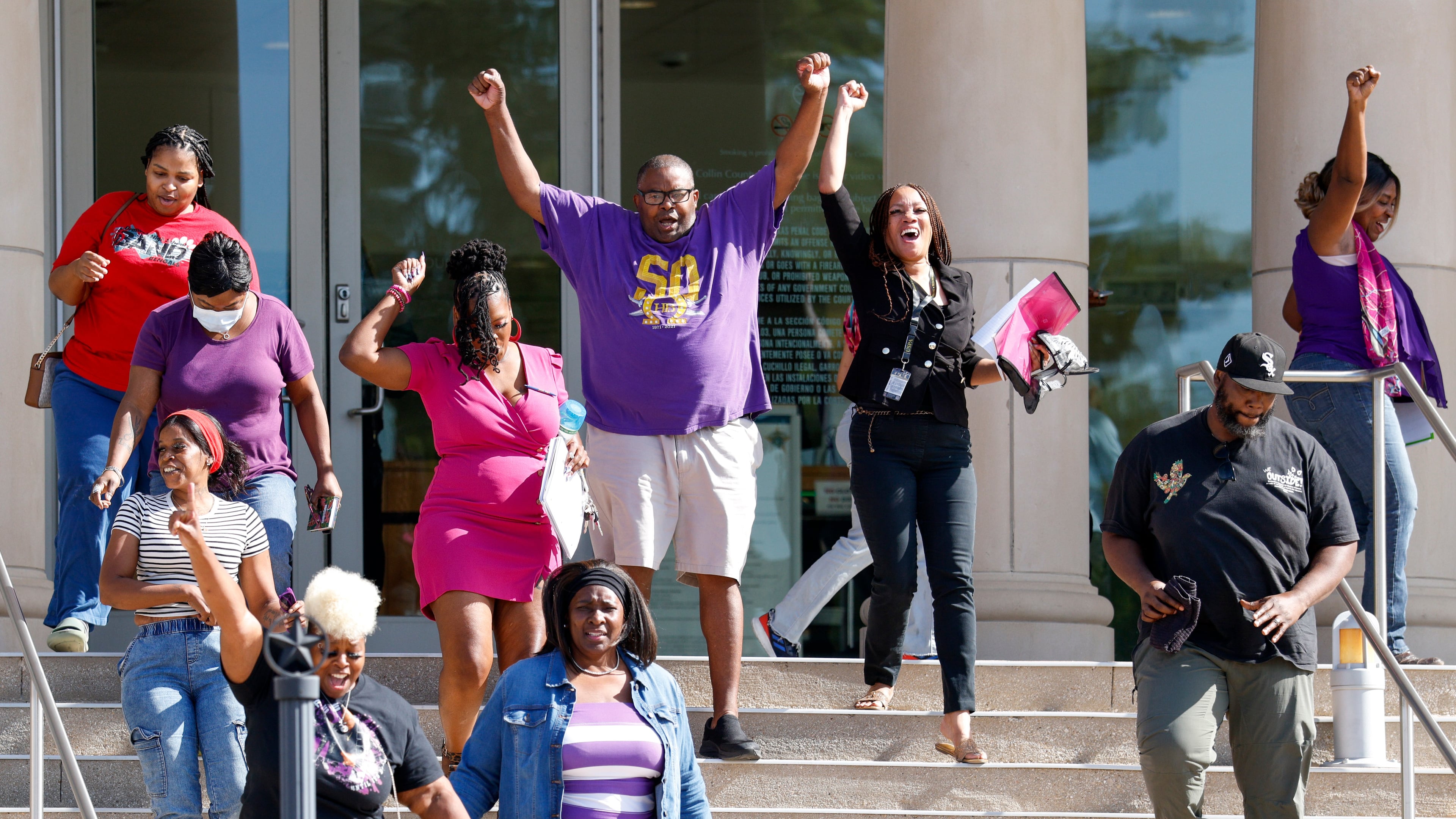 Supporters of Karmelo Anthony react after Judge John Roach Jr. was recused from the next phase of Anthony's murder trial outside the Collin County Courthouse on Wednesday, Aug. 19, 2026, in McKinney, Texas. (Elías Valverde II/The Dallas Morning News via AP)