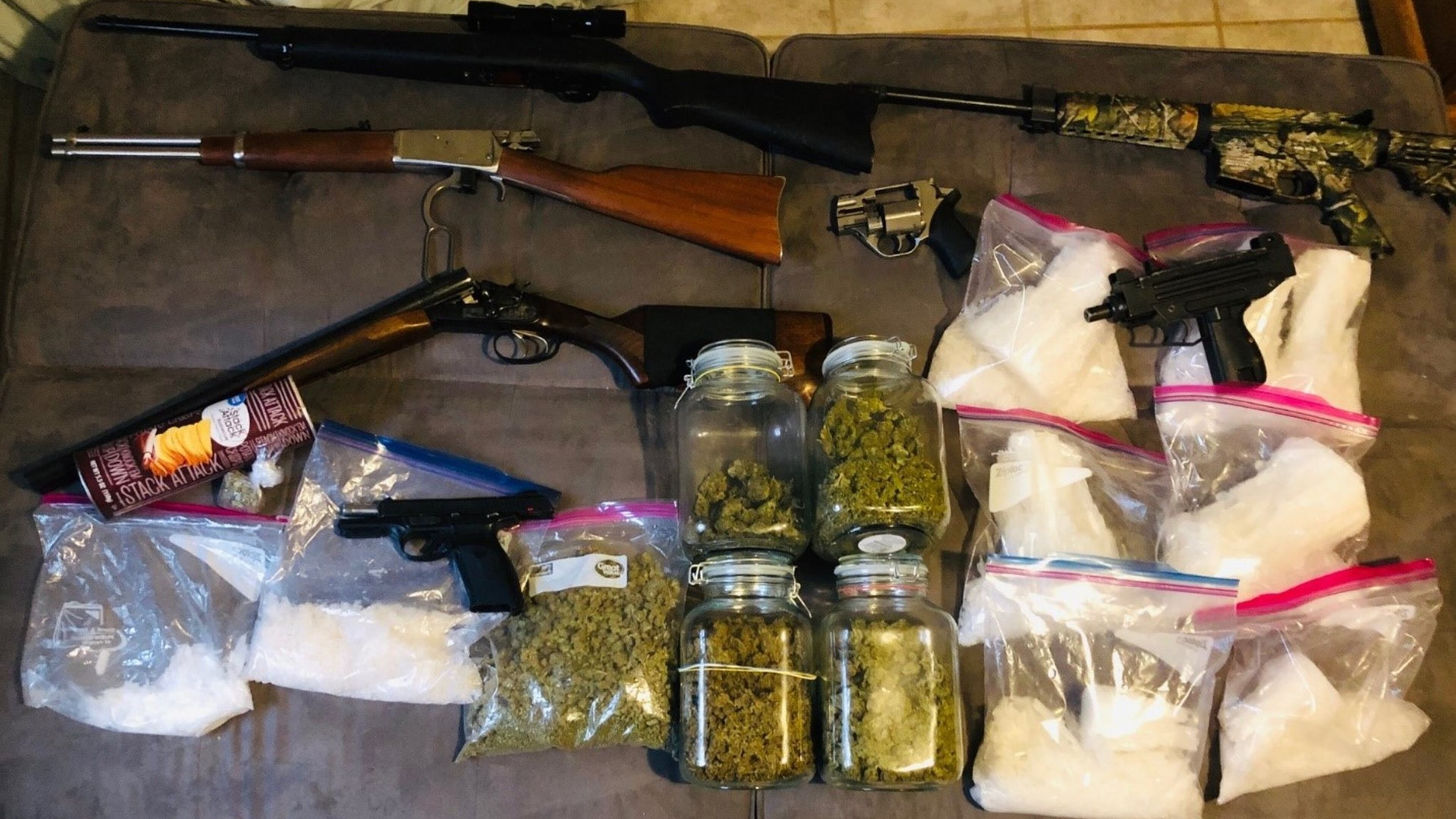 A sampling of items seized Tuesday during two Gwinnett County gang stash houses. (credit: Georgia Bureau of Investigation)