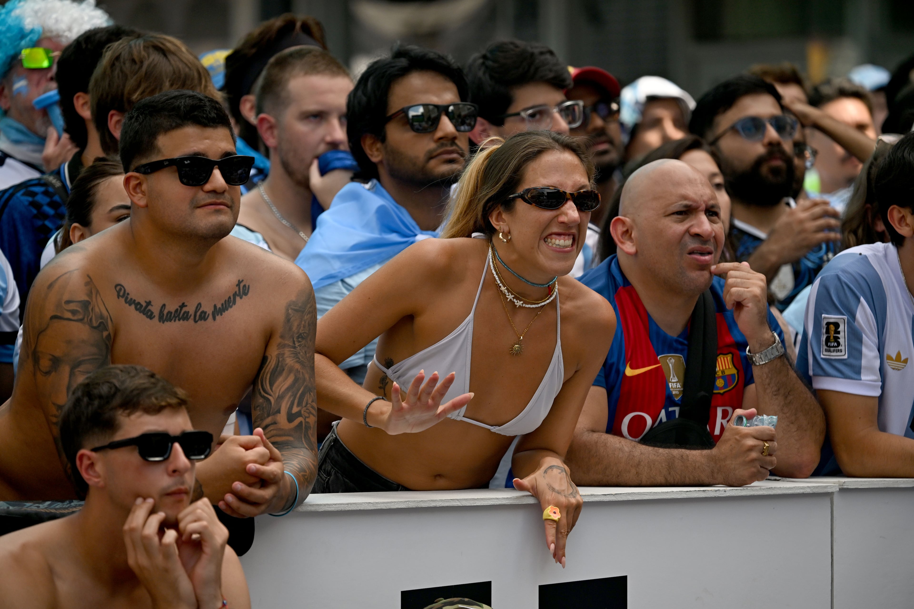 Argentina fans react as they gather at Underground Atlanta to watch the FIFA World Cup semifinal between Argentina and England on Wednesday, July 15, 2026, in Atlanta. (Hyosub Shin/AJC)