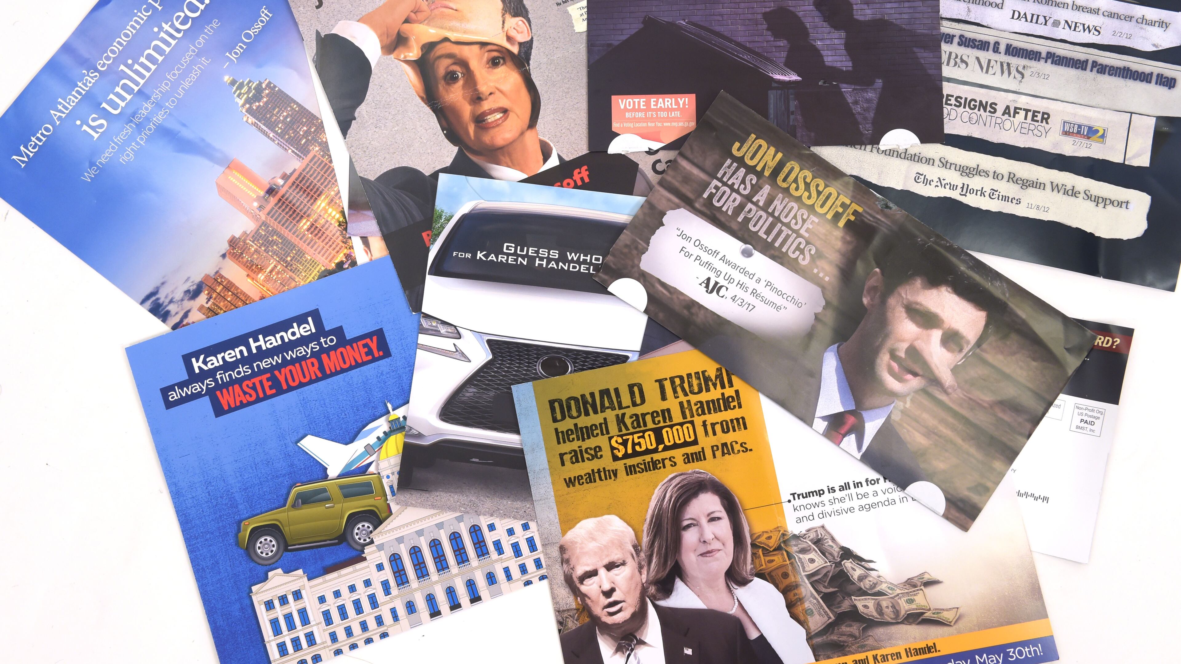 Campaign mailers for 6th District candidates Jon Ossoff and Karen Handel. KENT D. JOHNSON / AJC