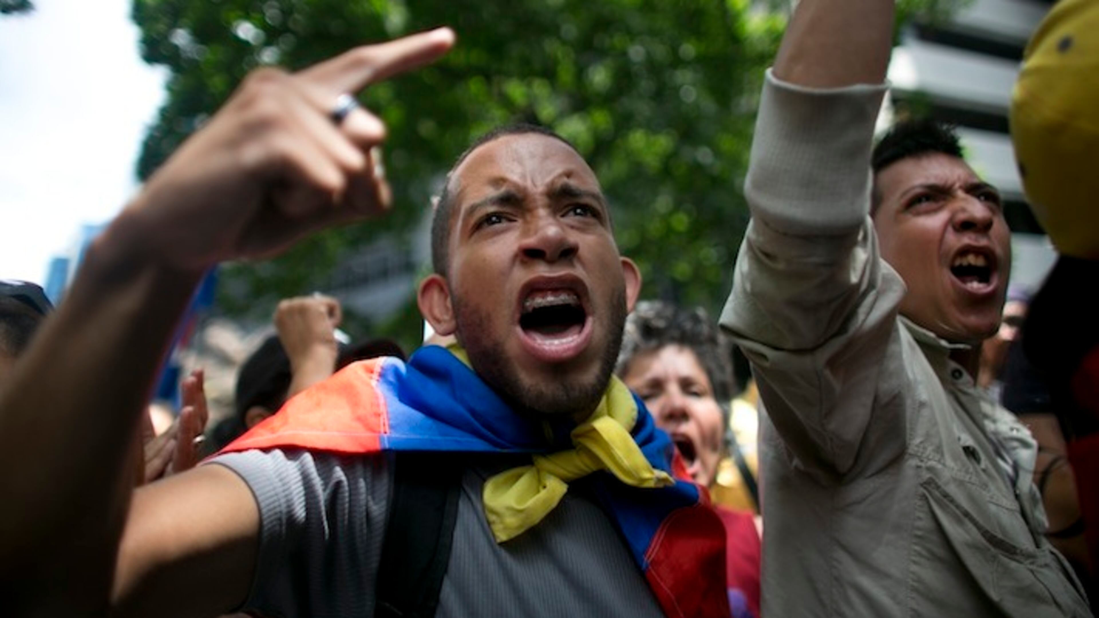 Opposition protesters shout out "Maduro" during a demonstration demanding the government pursue a referendum to recall President Nicolas Maduro, in Caracas, Venezuela, Wednesday, May 25, 2016. (AP Photo/Ariana Cubillos)