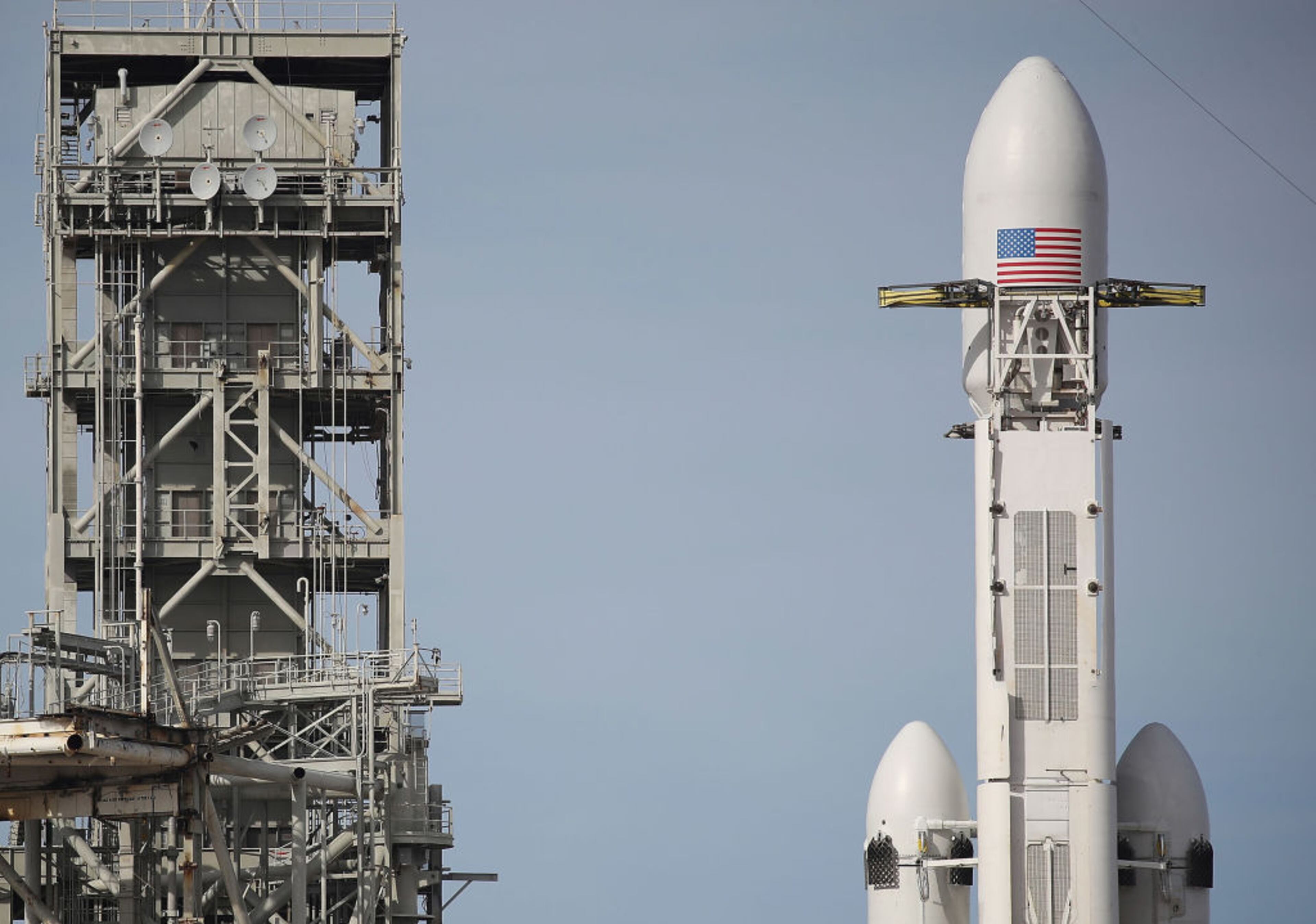 CAPE CANAVERAL, FL - FEBRUARY 05: The SpaceX Falcon Heavy rocket sits on launch pad 39A at Kennedy Space Center as it is prepared for tomorrow's lift-off on February 5, 2018 in Cape Canaveral, Florida. The rocket, which is the most powerful rocket in the world, is scheduled to make its maiden flight between 1:30 and 4:30 p.m. tomorrow. (Photo by Joe Raedle/Getty Images)
