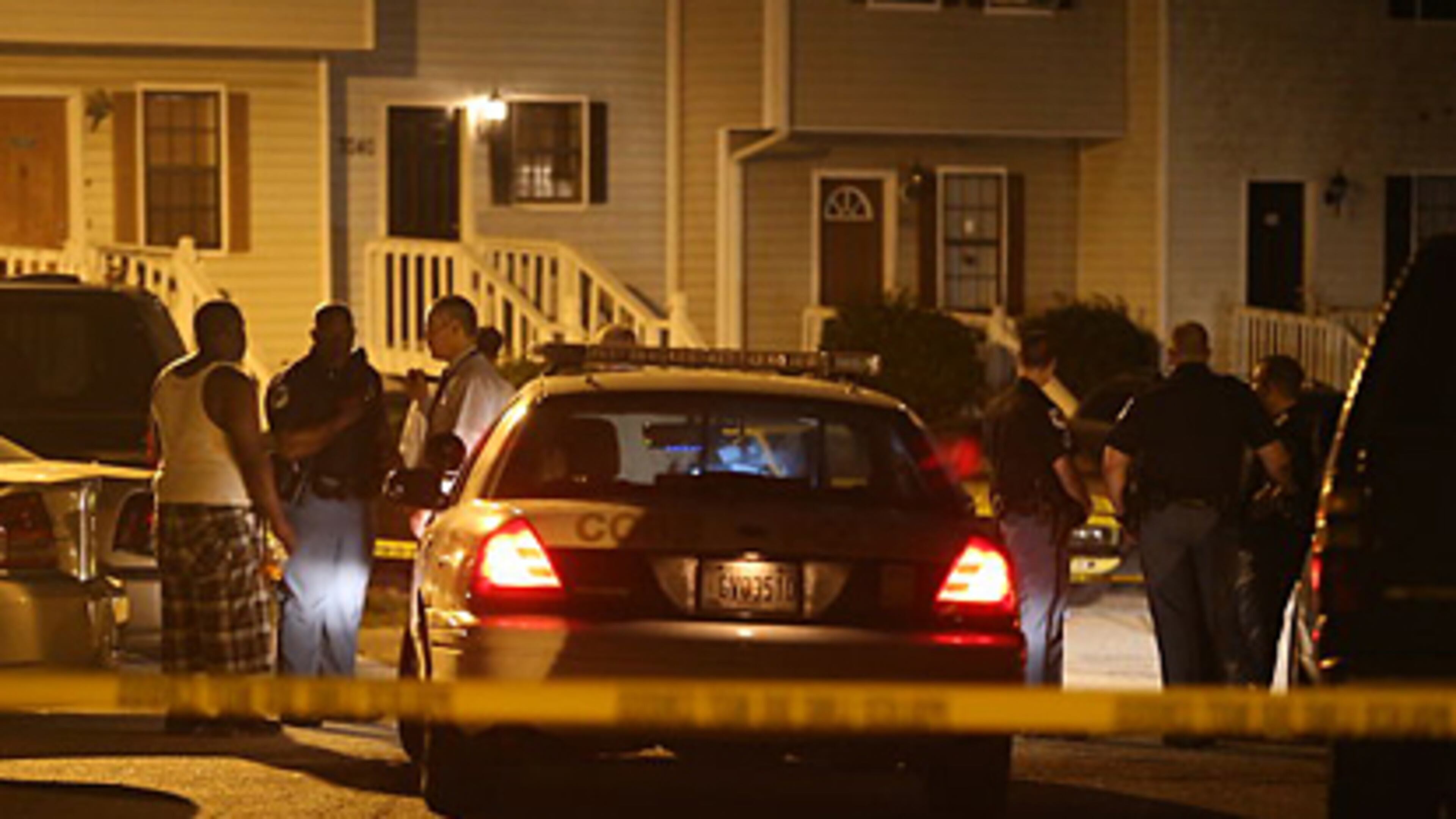 Police worked the scene in 7000 block of Oakhill Circle in Austell on Sept. 17, 2013.