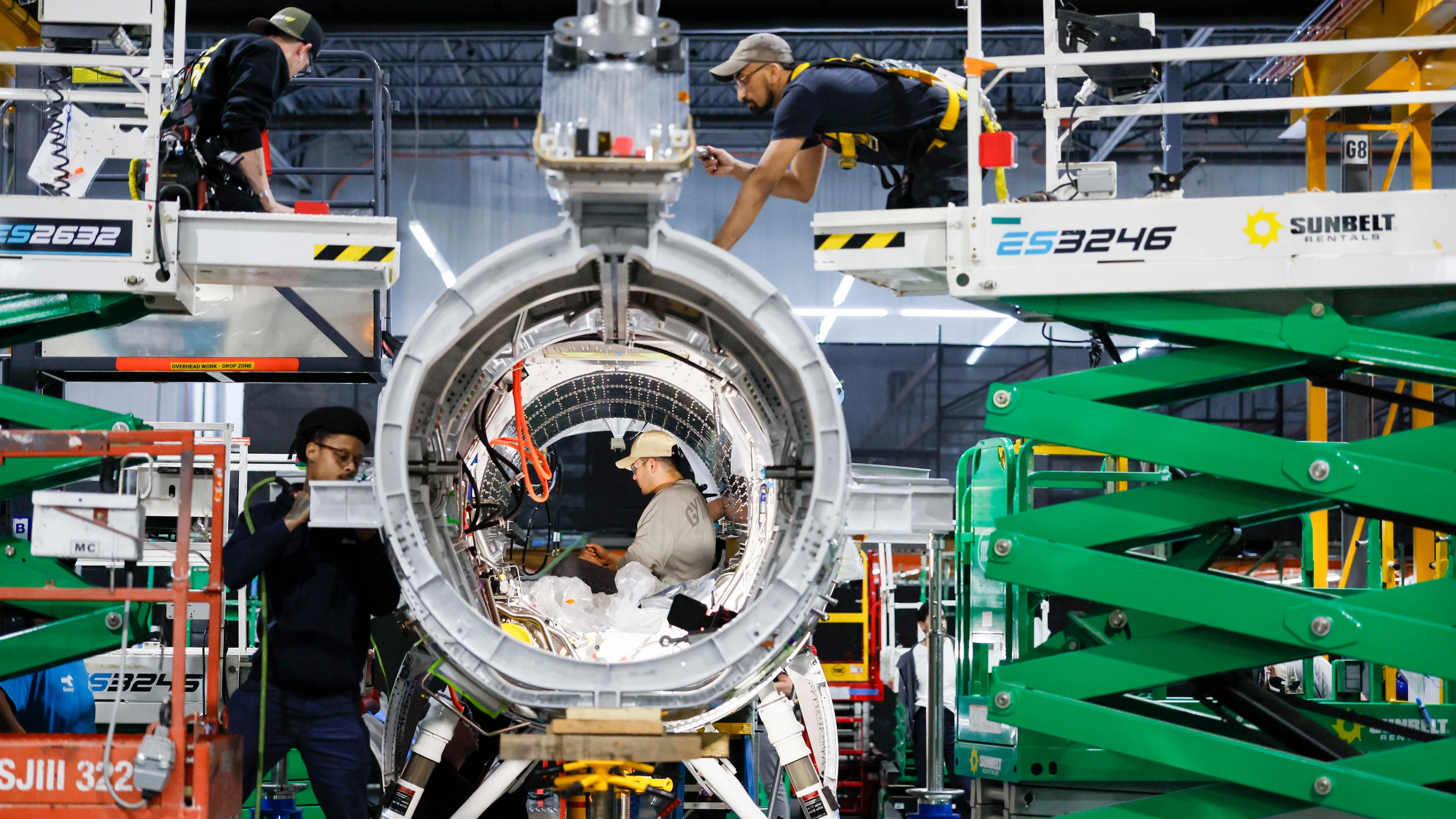 Mechanical engineers assembling the Quarterhorse Mk 2.2 aircraft at Hermeus’ Doraville facility on Tuesday, May 12, 2026. Hermeus, a company developing supersonic aircraft, aims to carry out its third test of an uncrewed, remotely piloted aircraft this coming fall. (Miguel Martinez/AJC)