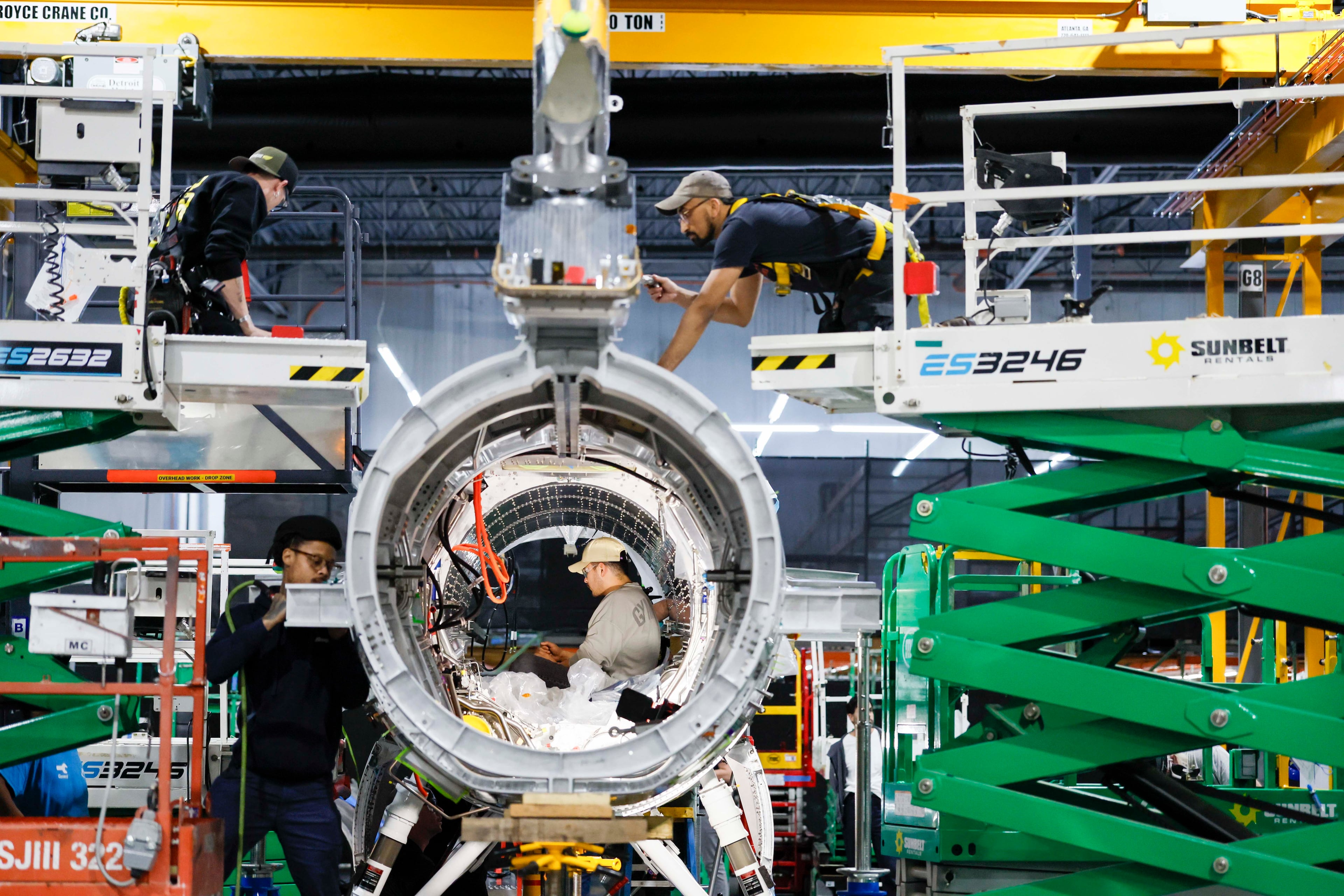 Mechanical engineers assembling the Quarterhorse Mk 2.2 aircraft at Hermeus’ Doraville facility on Tuesday, May 12, 2026. Hermeus, a company developing supersonic aircraft, aims to carry out its third test of an uncrewed, remotely piloted aircraft this coming fall. (Miguel Martinez/AJC)