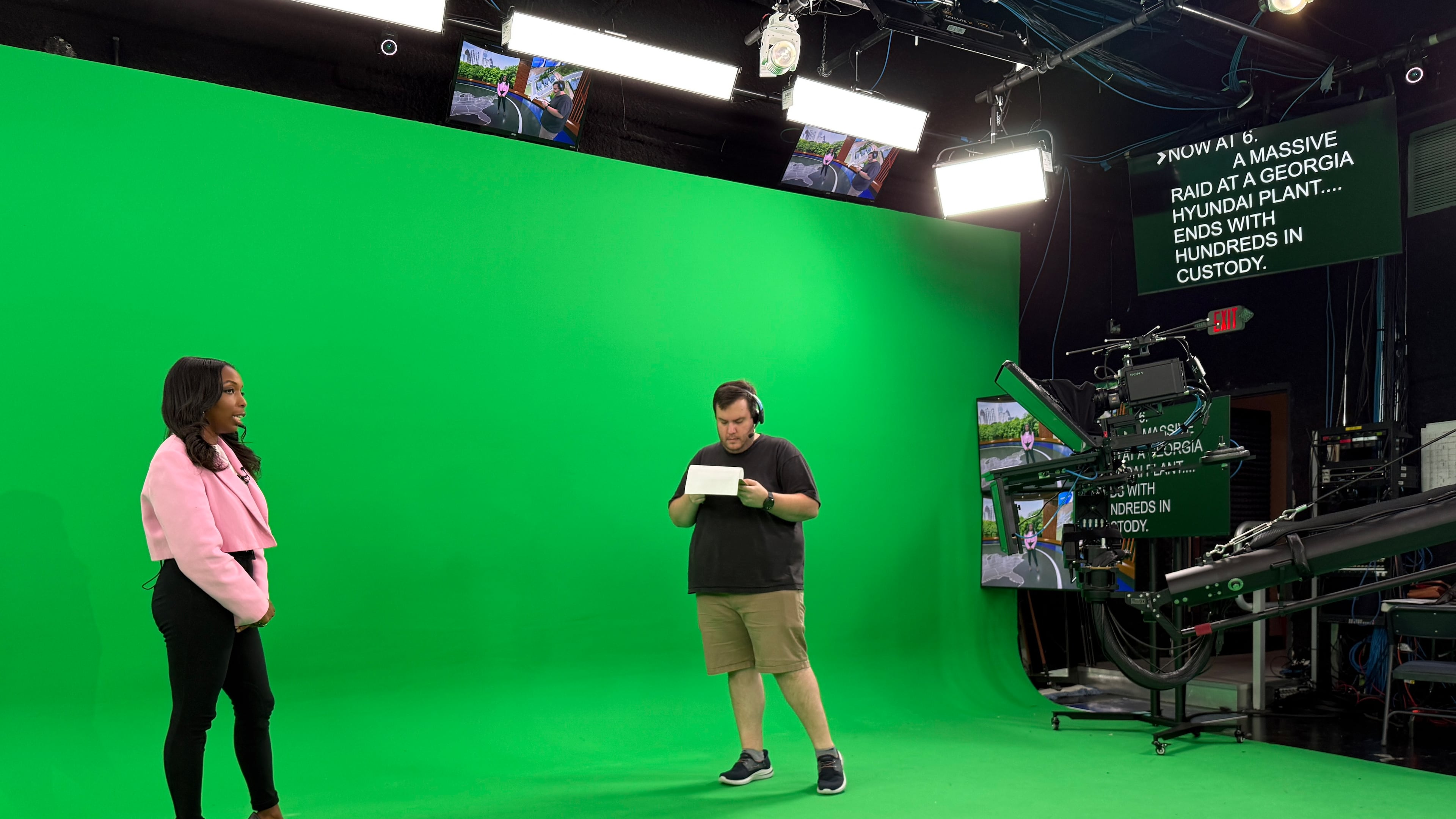 CBS Atlanta news anchor Jobina Fortson-Evans and director Sam Snook rehearse for an upcoming newscast on Friday, Sept. 5, 2025, in Atlanta. The station is launching its first newscasts on Monday with a fully augmented and virtual reality newsroom. (Alex Sanz/CBS News)