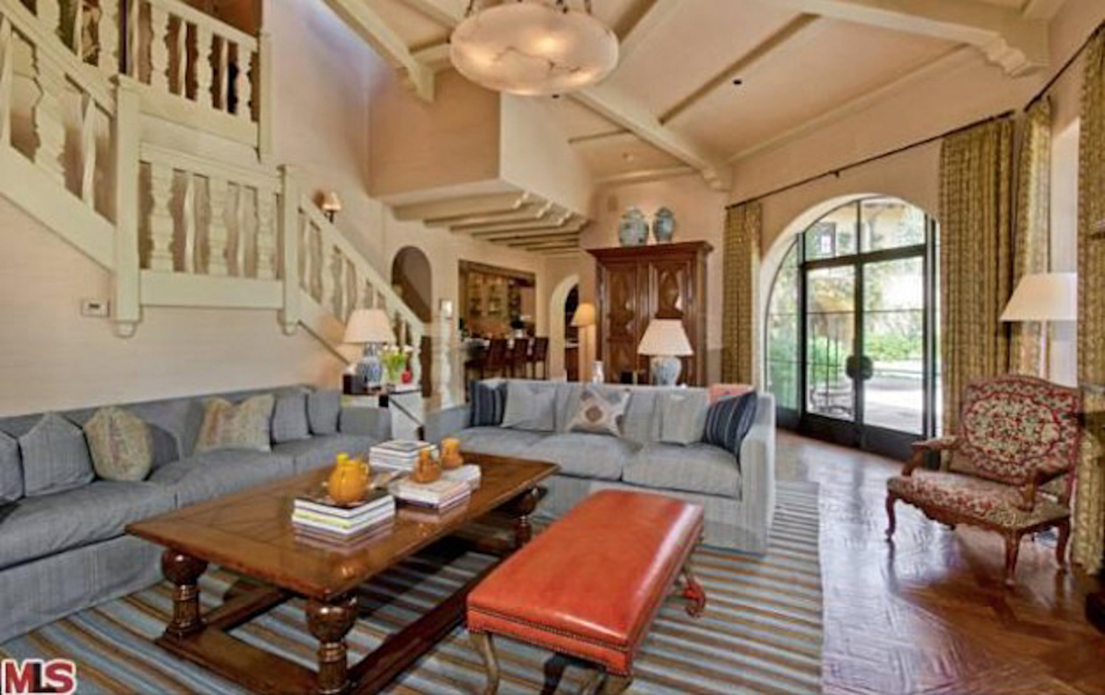 Take a peek inside Christina Aguilera's Beverly Hills mansion. The home, which Aguilera bought for $10.75 million in 2013, features six bedrooms, nine bathrooms, a master suite with a fireplace, a patio, an office, a spa bath, a screening room and wet bars. The property also includes a pool and spa. For more information, visit http://www.toptenrealestatedeals.com/homes/weekly-ten-best-home-deals/2013/5-14-2013/.