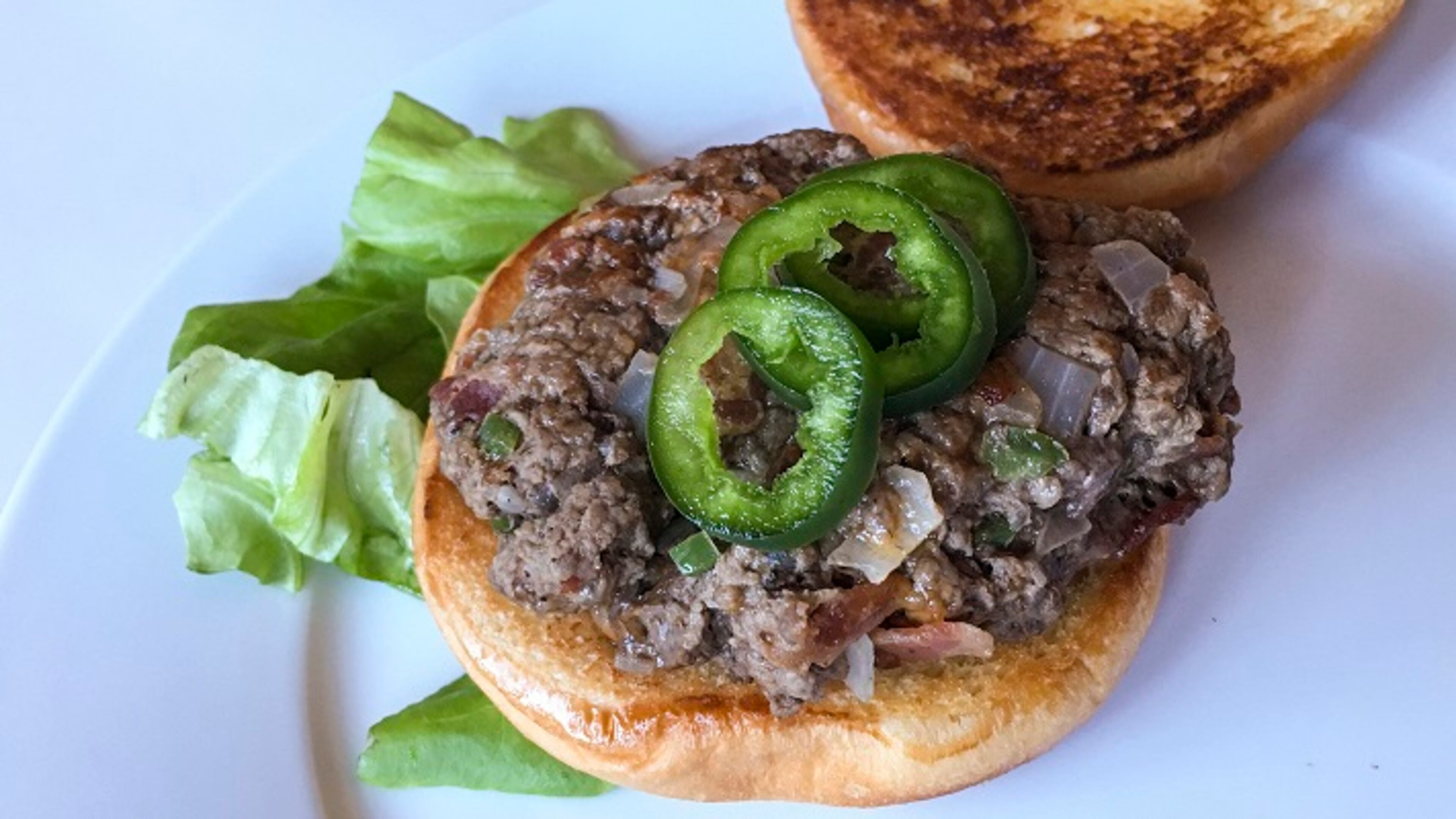Cowboy Burgers with jalapeno, bacon and Cheddar. (Lee Svitak Dean/Minneapolis Star Tribune)