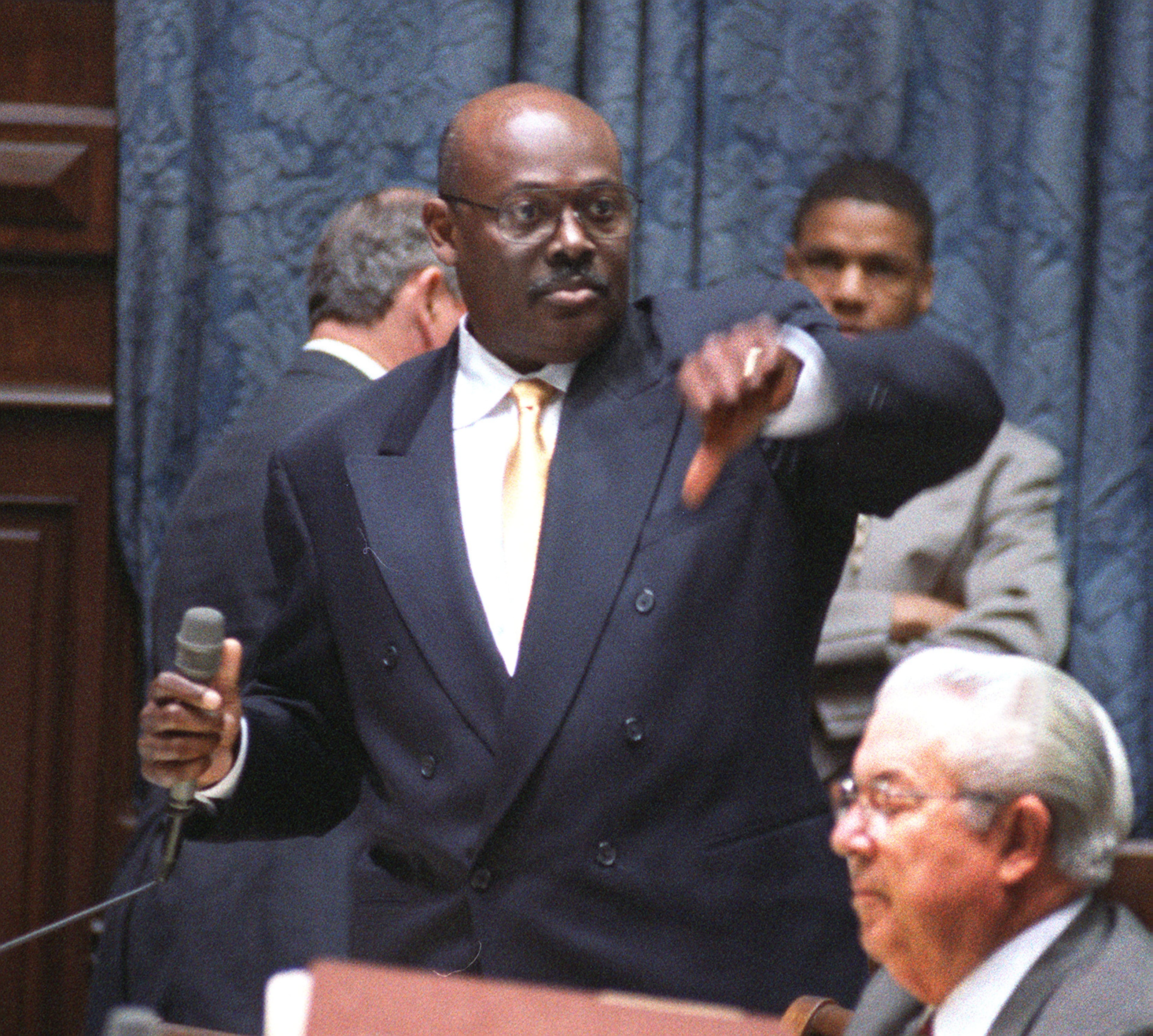 Charles Walker, seen here at the state Capitol in 1998 telling his colleagues to vote "no" on some amendments to a resolution that addressed parole and criminal sentencing. (Kimberly Smith/AJC)
