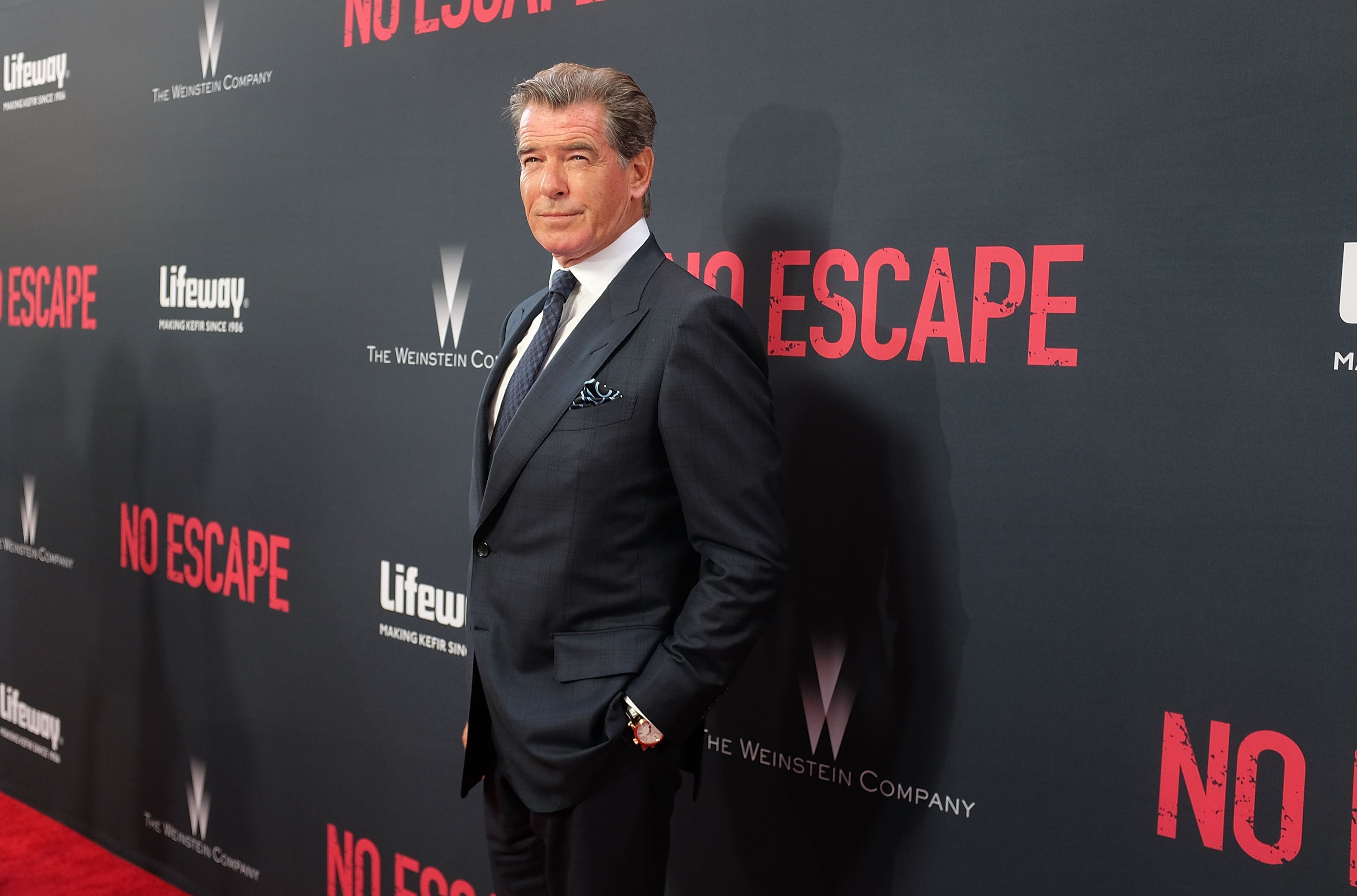 LOS ANGELES, CA - AUGUST 17: Pierce Brosnan attends the premiere of the Weinstein Company's 'No Escape' at Regal Cinemas L.A. Live on August 17, 2015 in Los Angeles, California. (Photo by Araya Diaz/Getty Images for The Weinstein Company)