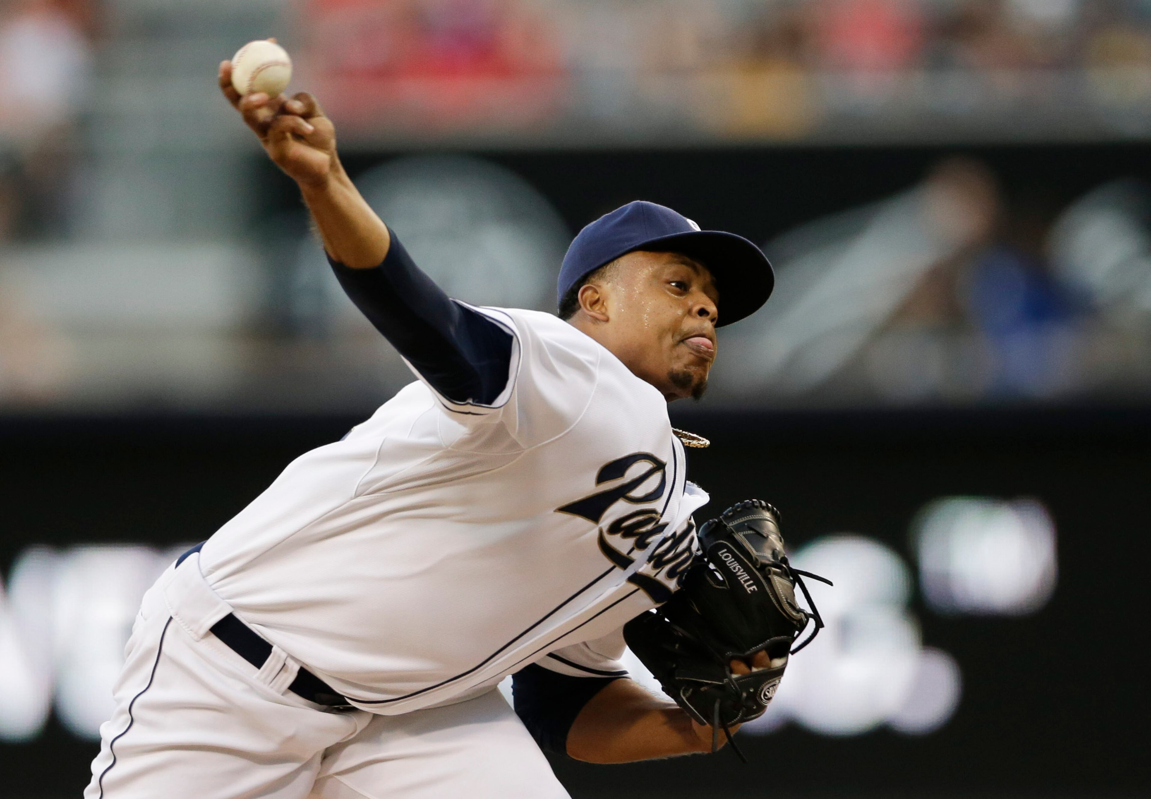San Diego Padres starting pitcher Edinson Volquez throws against the Cincinnati Reds during the first inning during a baseball game Tuesday, July 30, 2013, in San Diego. (AP Photo/Gregory Bull)