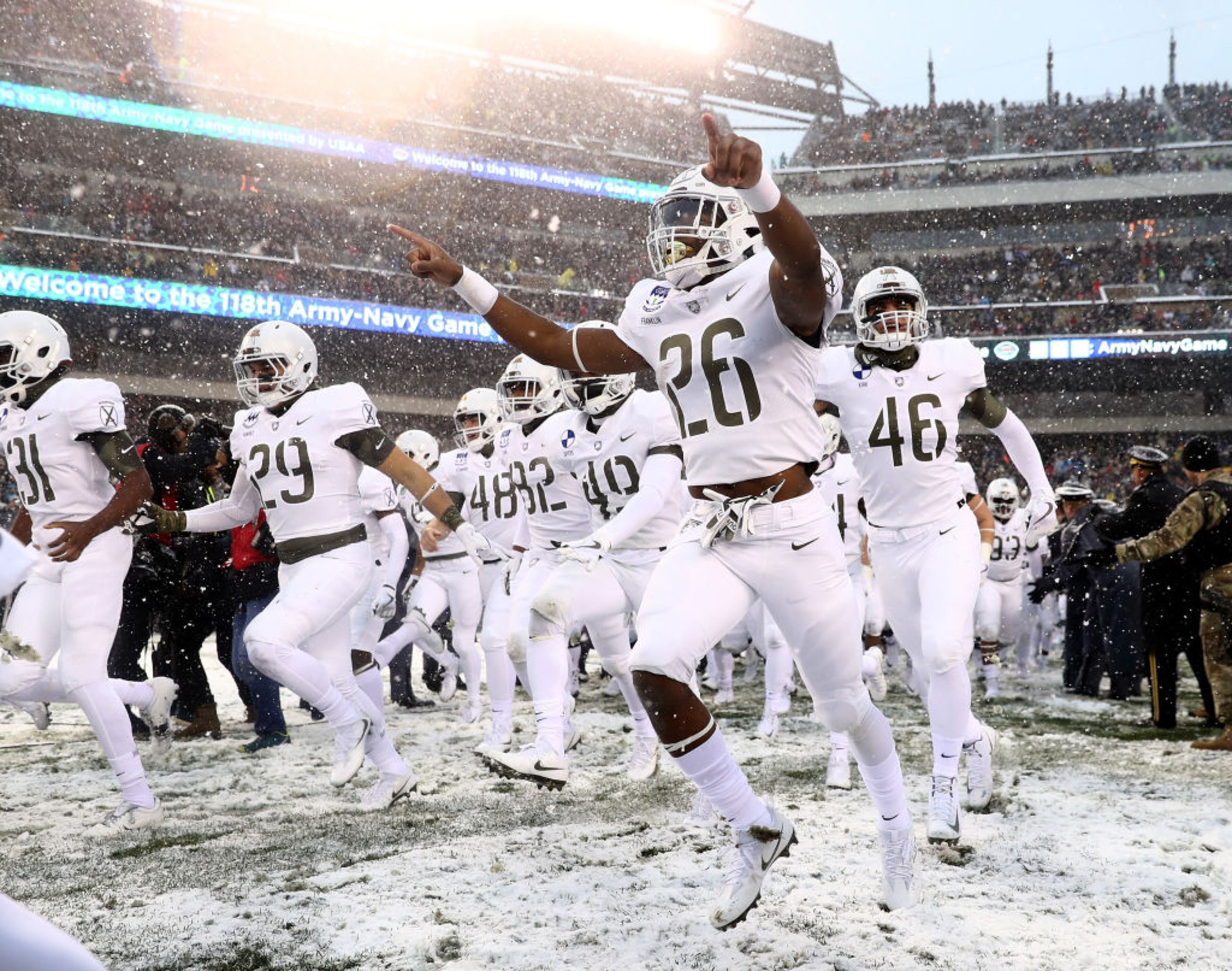 PHILADELPHIA, PA - DECEMBER 09: Donovan Franklin #26 of the Army Black Knights and the rest of his teammates run out on the field before the game against the Navy Midshipmen on December 9, 2017 at Lincoln Financial Field in Philadelphia, Pennsylvania. (Photo by Elsa/Getty Images)