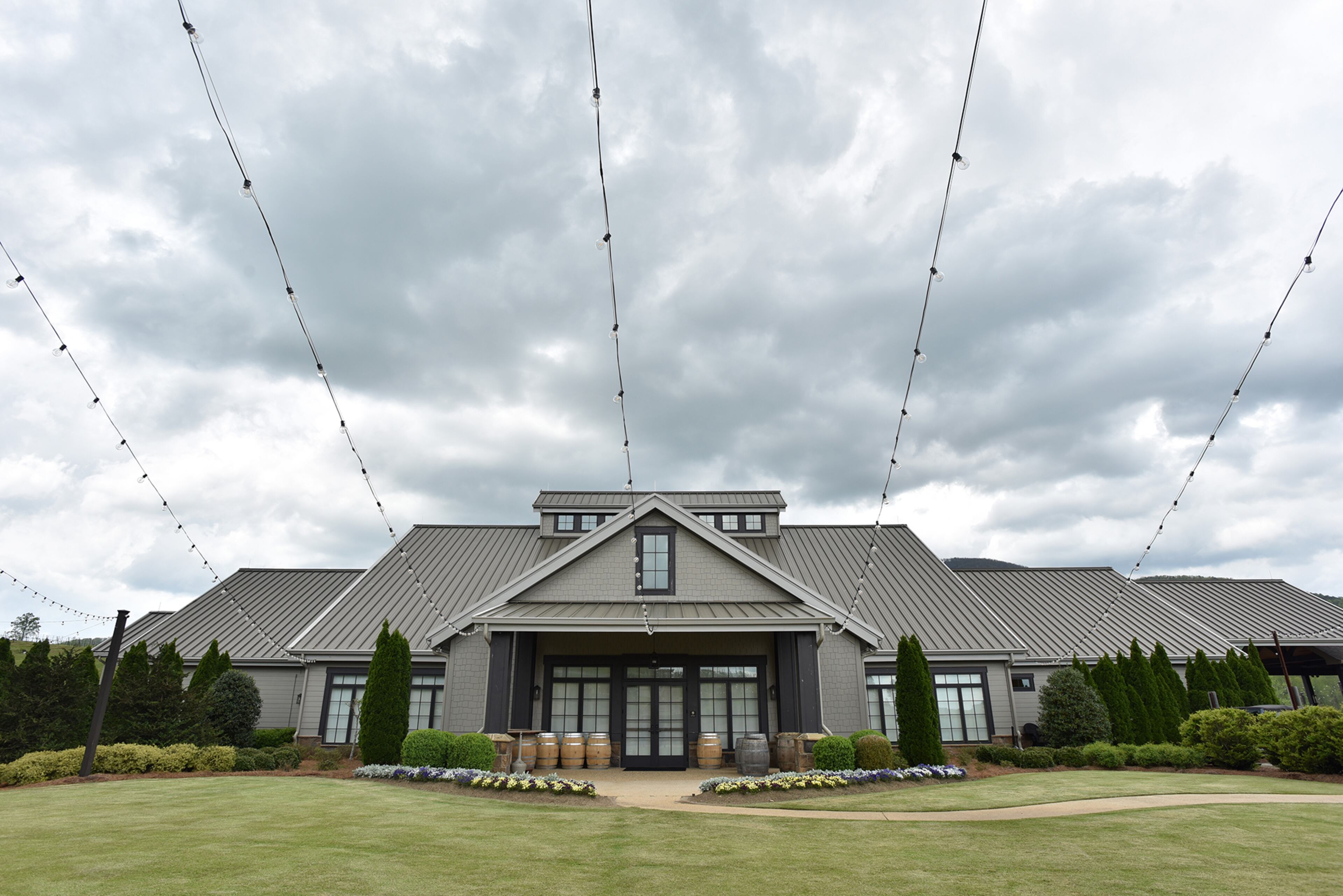 April 18, 2019 Cleveland - Exterior of event hall at Yonah Mountain Vineyards in Cleveland on Wednesday, April 18, 2019. Yonah Mountain Vineyards is the first winery in Georgia to implement a major solar power initiative with the goal of countering its carbon footprint. It is currently the only winery in the Southeast with a program of this size generating at least 60% of its total annual energy usage. HYOSUB SHIN / HSHIN@AJC.COM