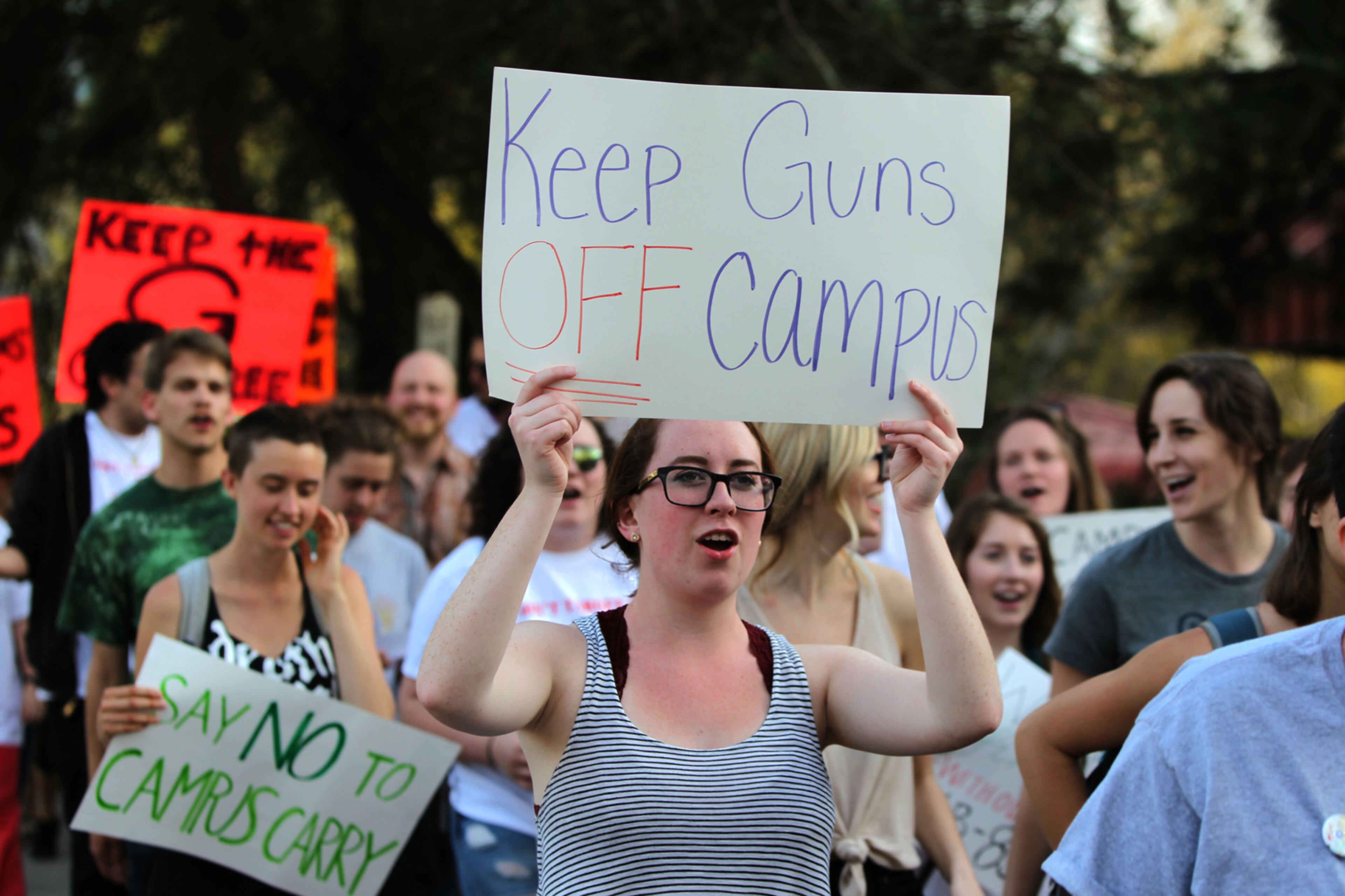 March 16, 2016 Athens - Protestors against Campus Carry march to the arch at the University of Georgia. Demonstrators urged Gov. Deal to veto HB 859, otherwise known as Campus Carry, which would allow guns on parts of campus. TAYLOR CARPENTER / TAYLOR.CARPENTER@AJC.COM