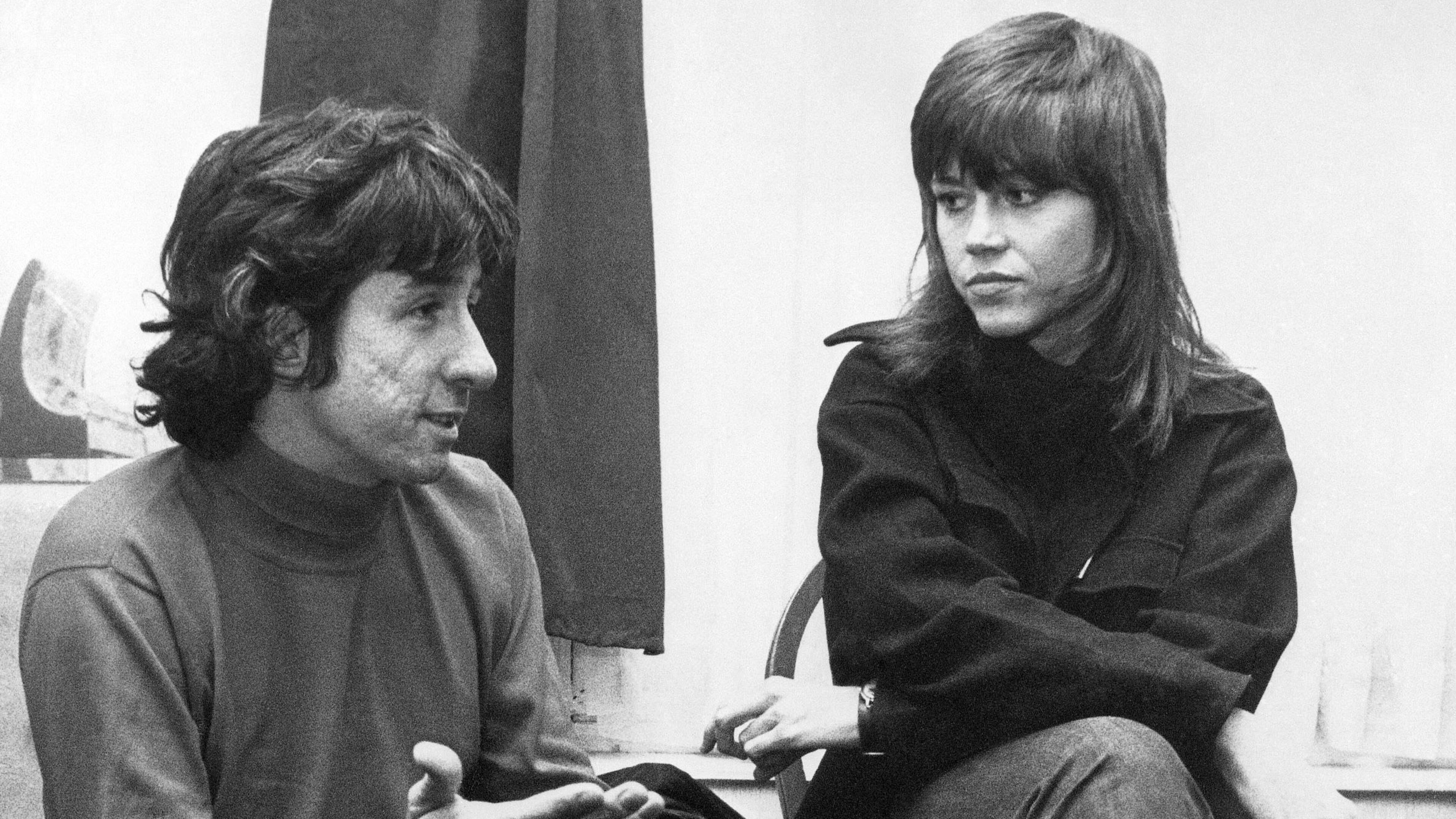 FILE - In this Dec. 26, 1972 file photo, actress Jane Fonda, right, and Tom Hayden, one of the founders of SDS, talk at the home of a friend in London, after their arrival from Paris. Hayden, the famed 1960s anti-war activist who moved beyond his notoriety as a Chicago 8 defendant to become a California legislator, author and lecturer, has died at age 76. His wife, Barbara Williams, says Hayden died on Sunday, Oct. 23, 2016, in Santa Monica of a long illness. (AP Photo, File)