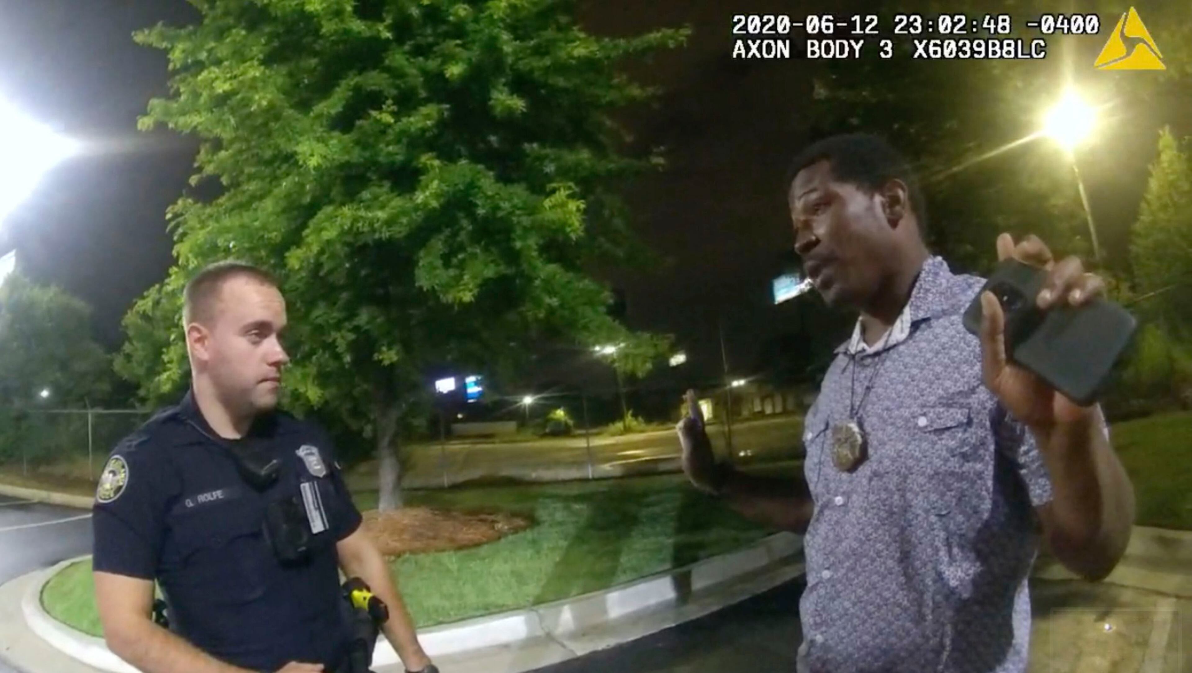In this June 12, 2020, file photo from body camera video provided by the Atlanta Police Department, Rayshard Brooks speaks with Officer Garrett Rolfe in the parking lot of a Wendy's restaurant in Atlanta. (File/Atlanta Police Department via AP)
