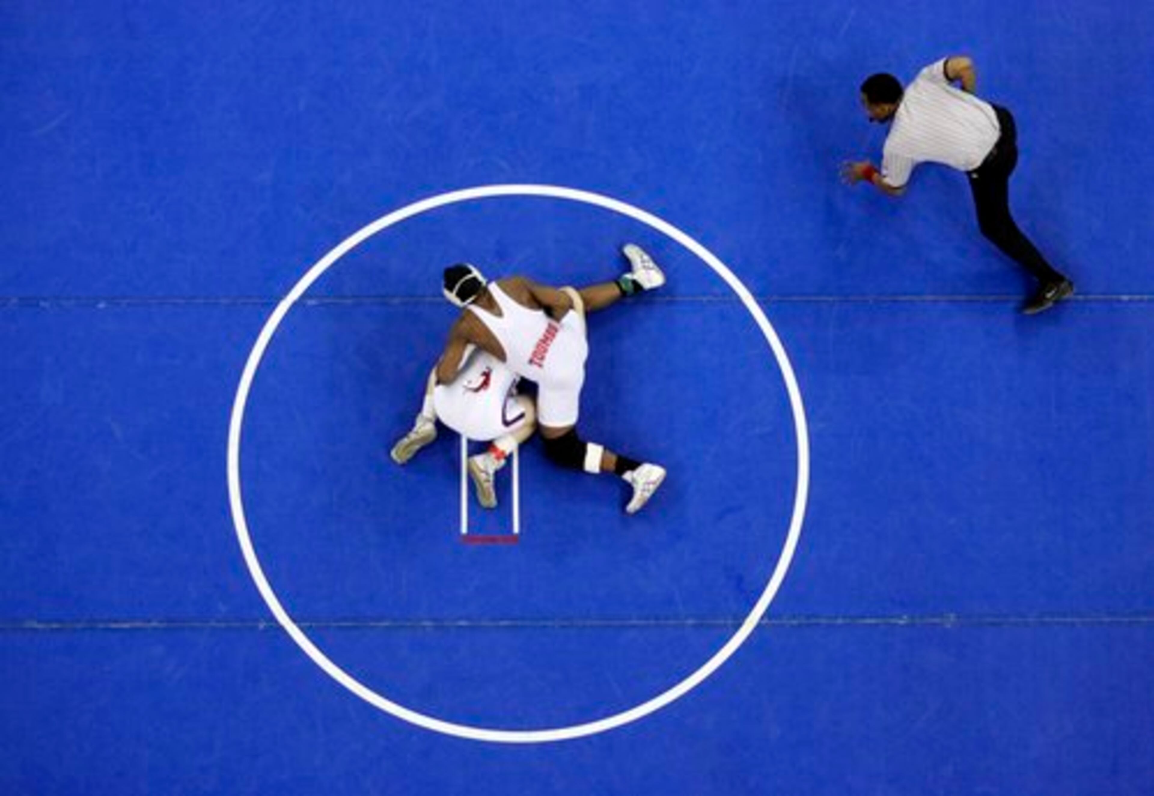 Toombs County's Demery Carter (on top) and Jefferson's Patrick Allen compete during the Class AA 215-pound finals.