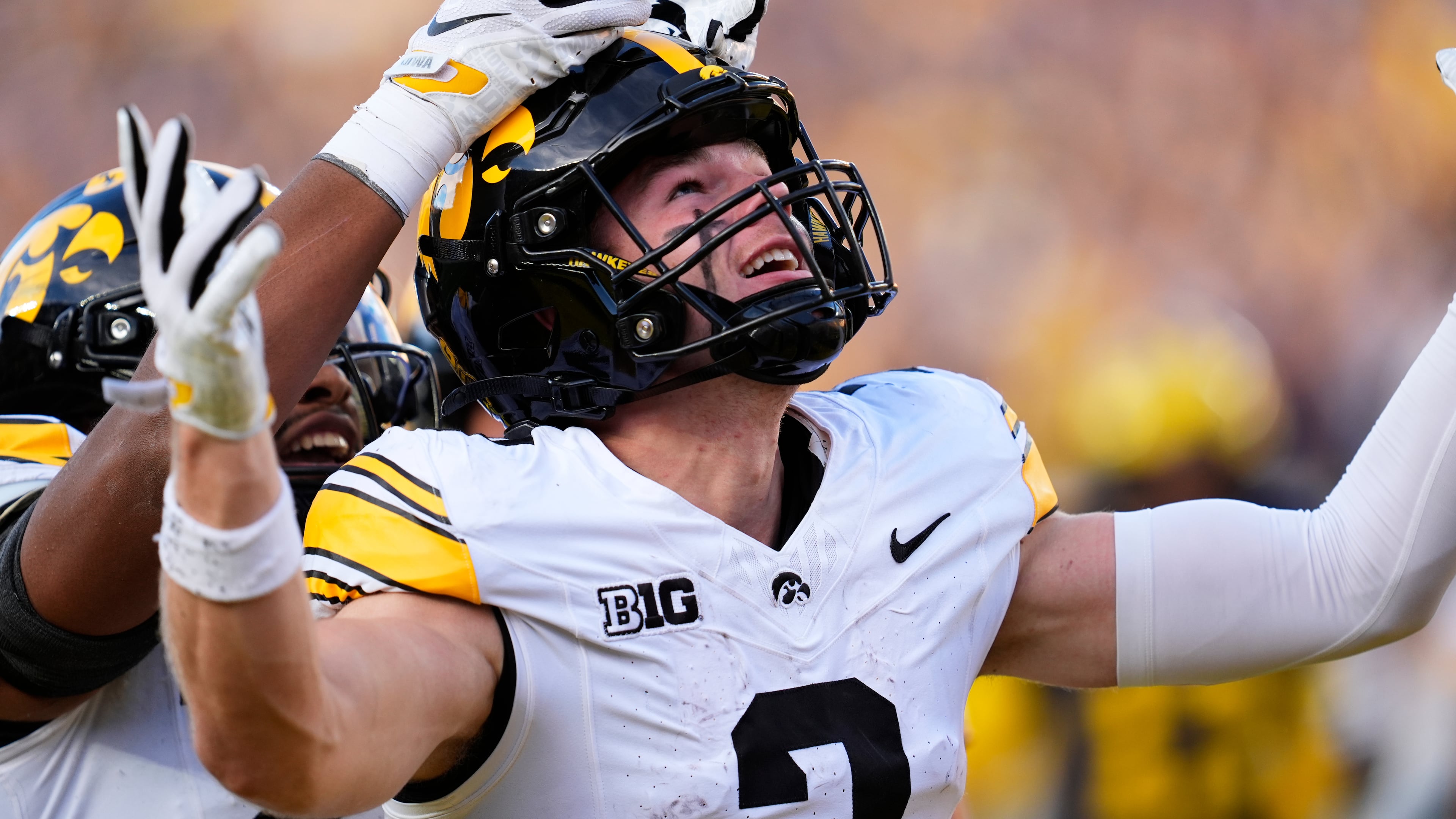 Iowa wide receiver Reece Vander Zee (2) celebrates his 16-yard touchdown reception against Michigan during the second half of an NCAA college football game in Ann Arbor, Mich., Saturday, Sept. 26, 2026. (AP Photo/Paul Sancya)